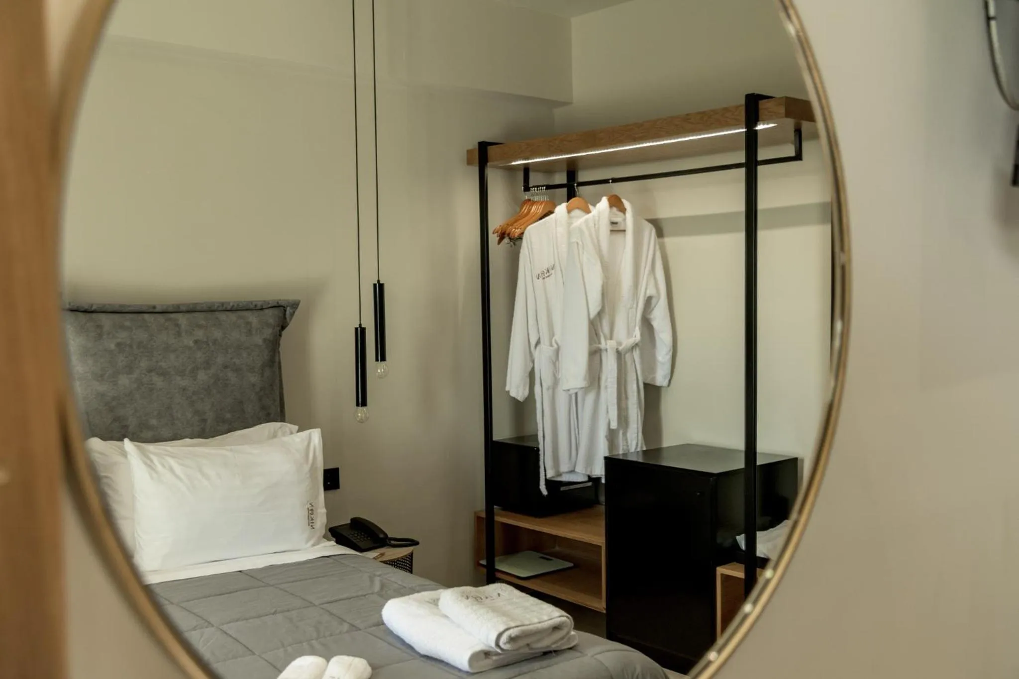 wardrobe, Bed in Nikon Boutique Hotel