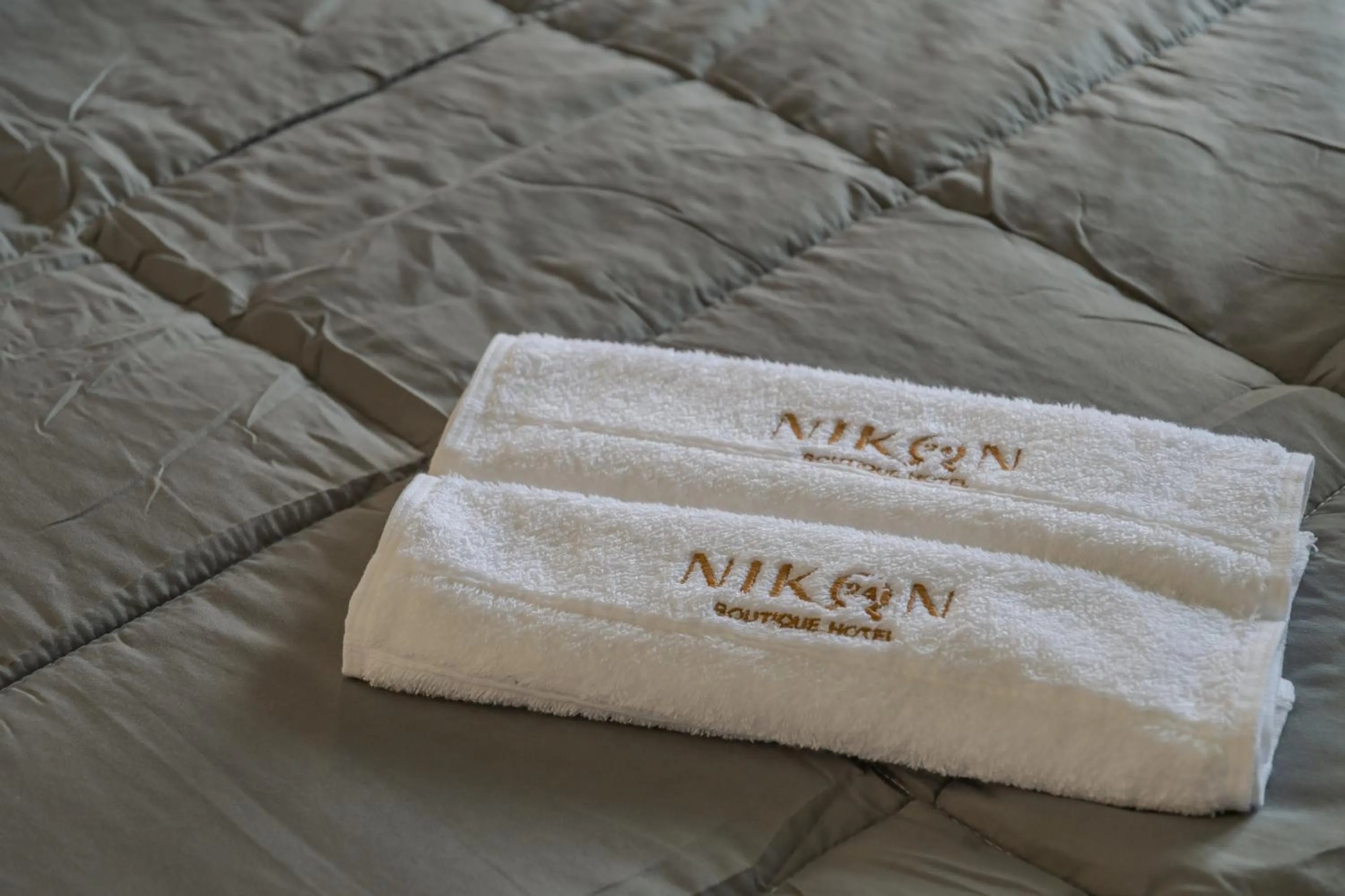 Bedroom in Nikon Boutique Hotel