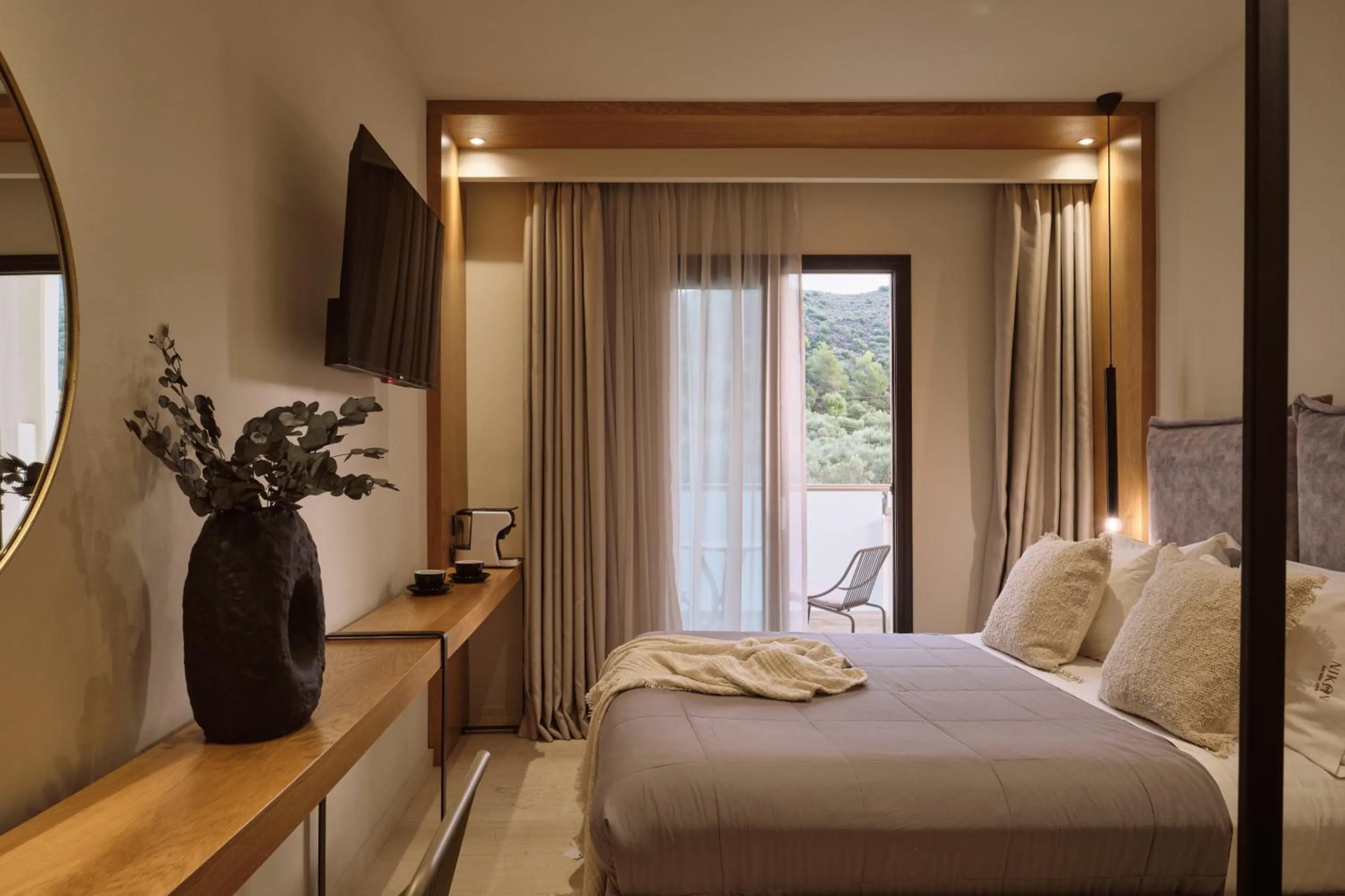 Photo of the whole room, Bed in Nikon Boutique Hotel