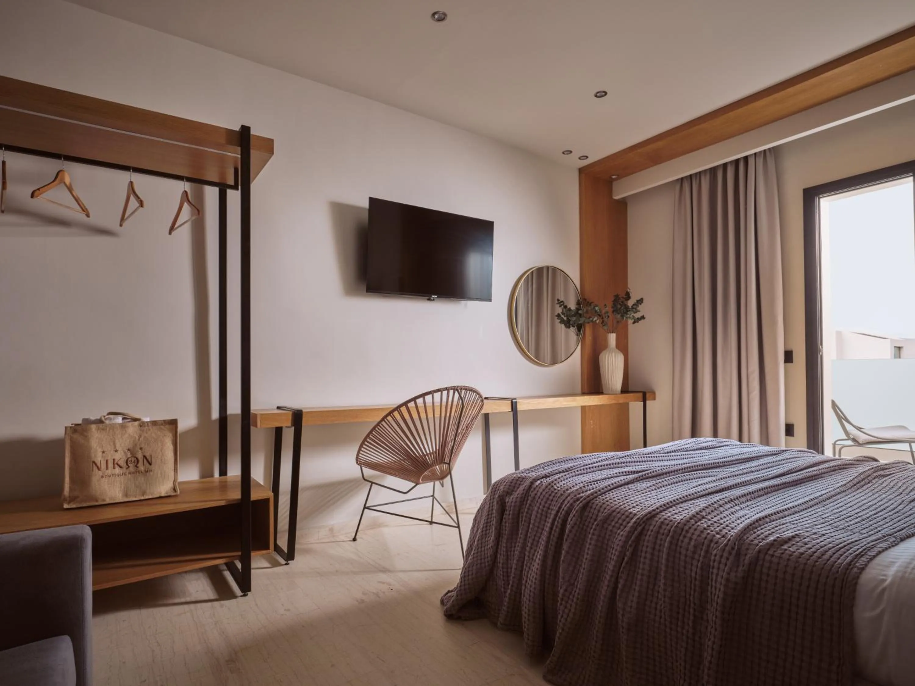 Photo of the whole room, Bed in Nikon Boutique Hotel