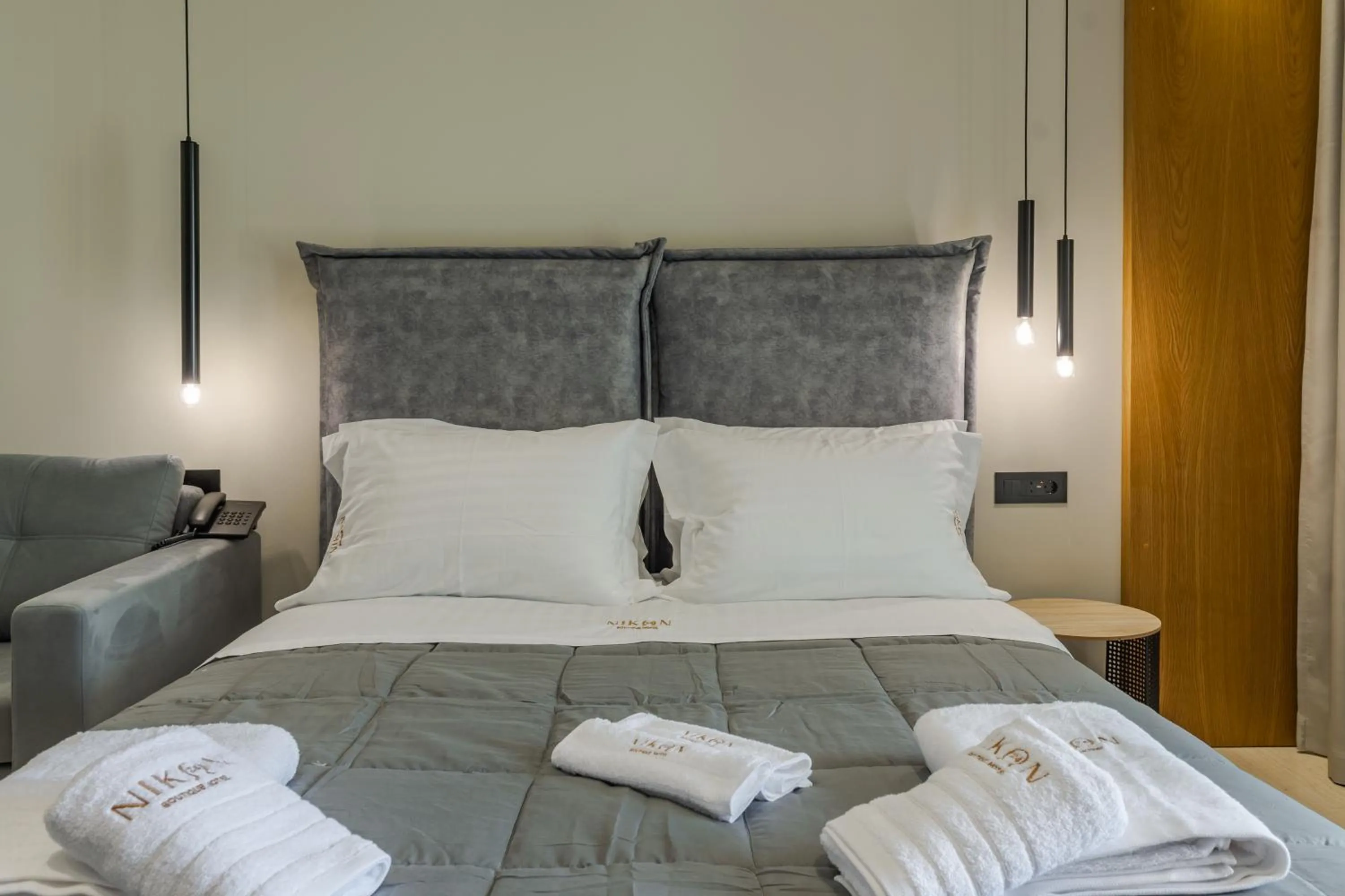 Bed in Nikon Boutique Hotel