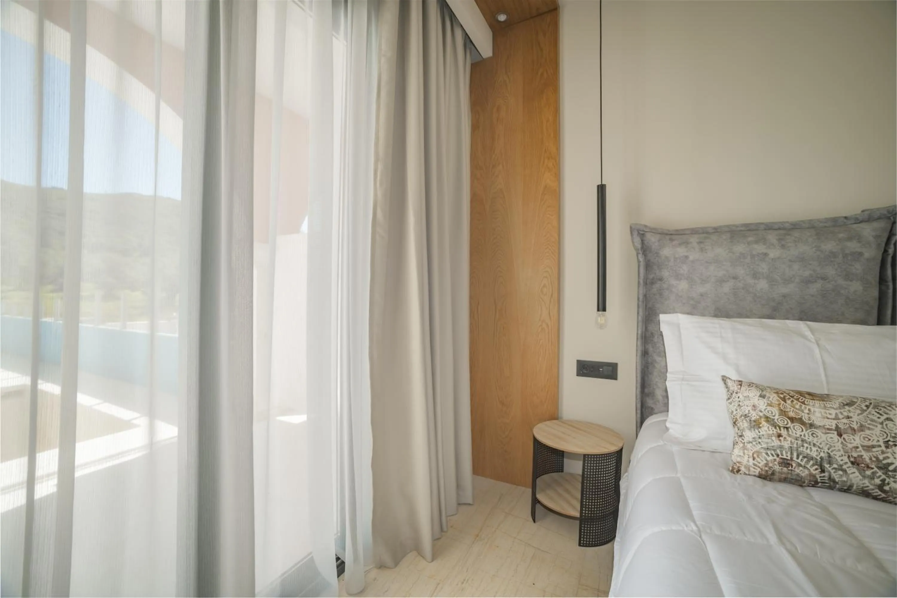 Bed in Nikon Boutique Hotel