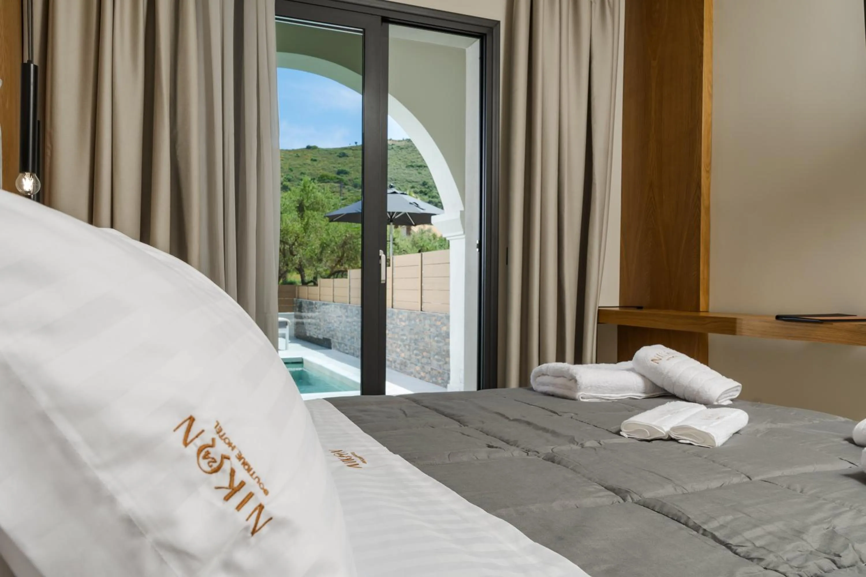 Bedroom, Bed in Nikon Boutique Hotel