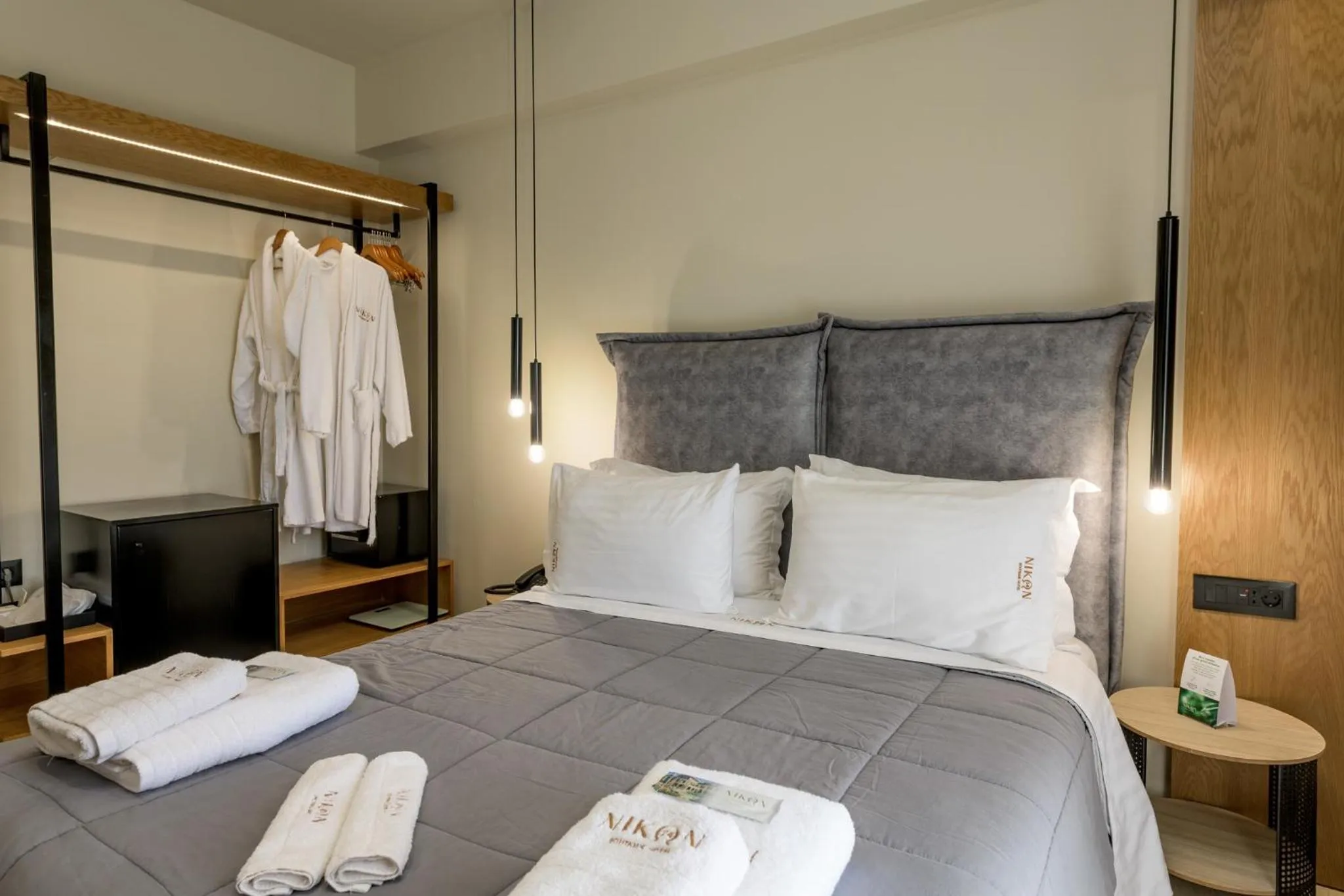 Bed in Nikon Boutique Hotel