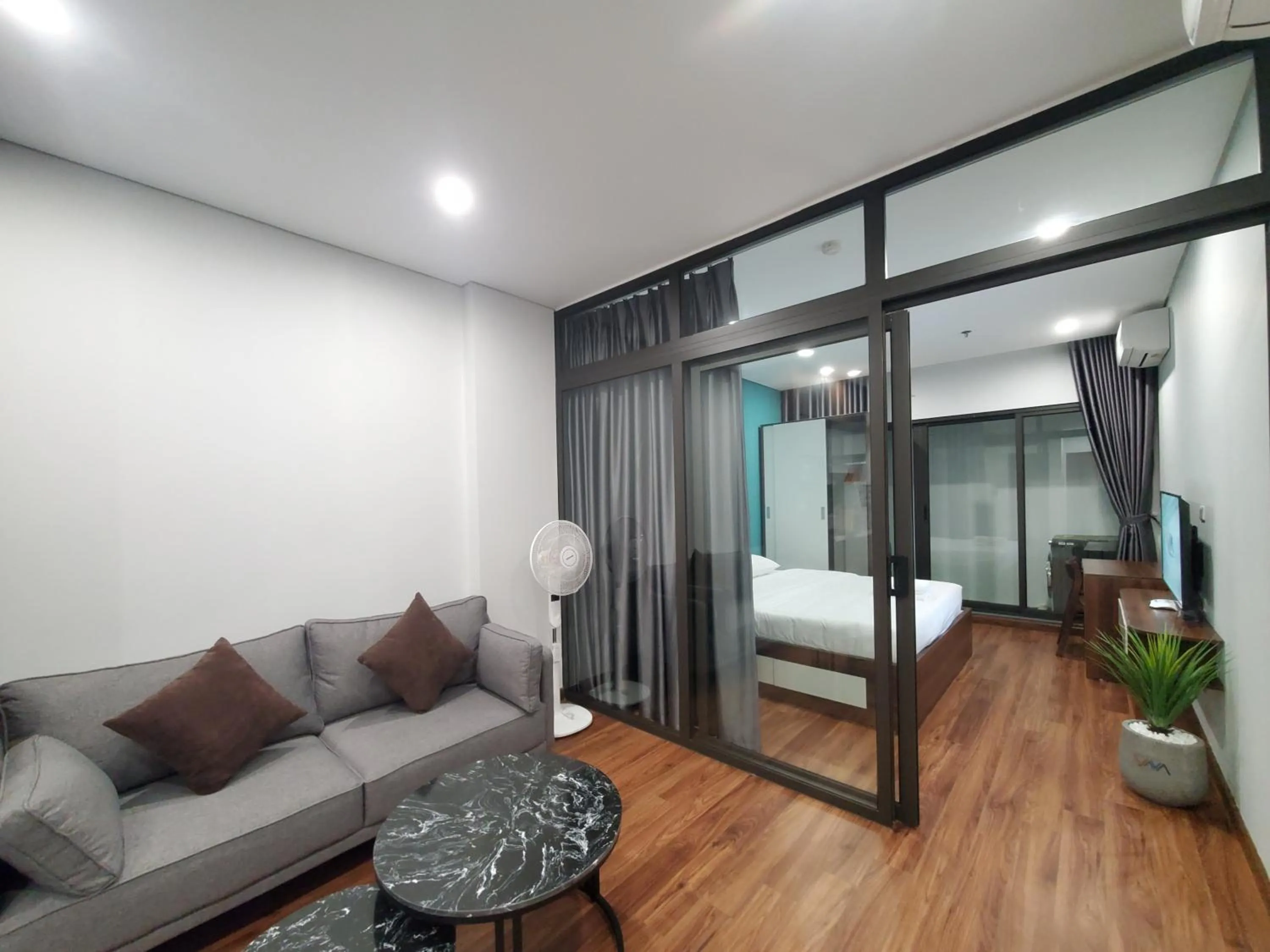 Living room, Bed in VNAHOMES APARTHOTEL