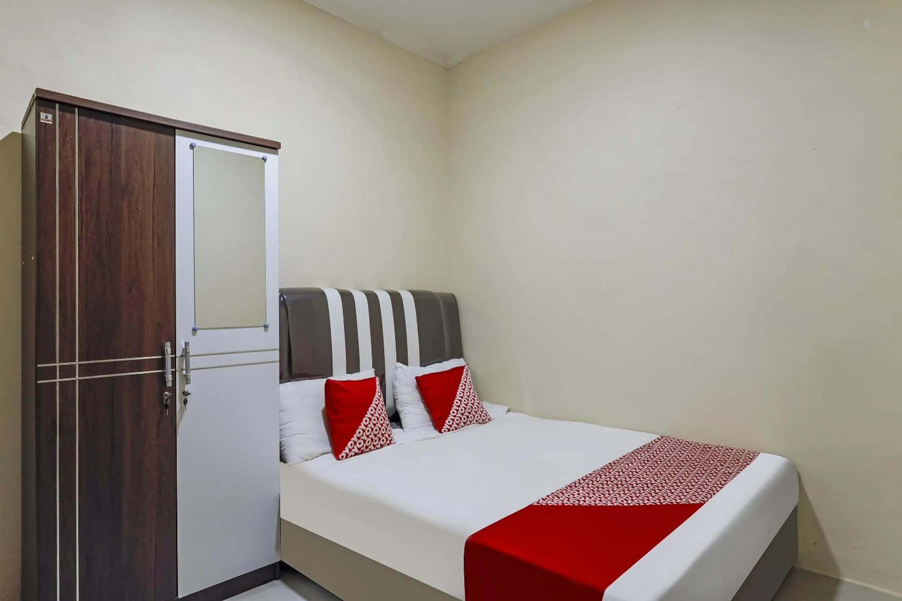 Bedroom in Hotel O X2 Homestay