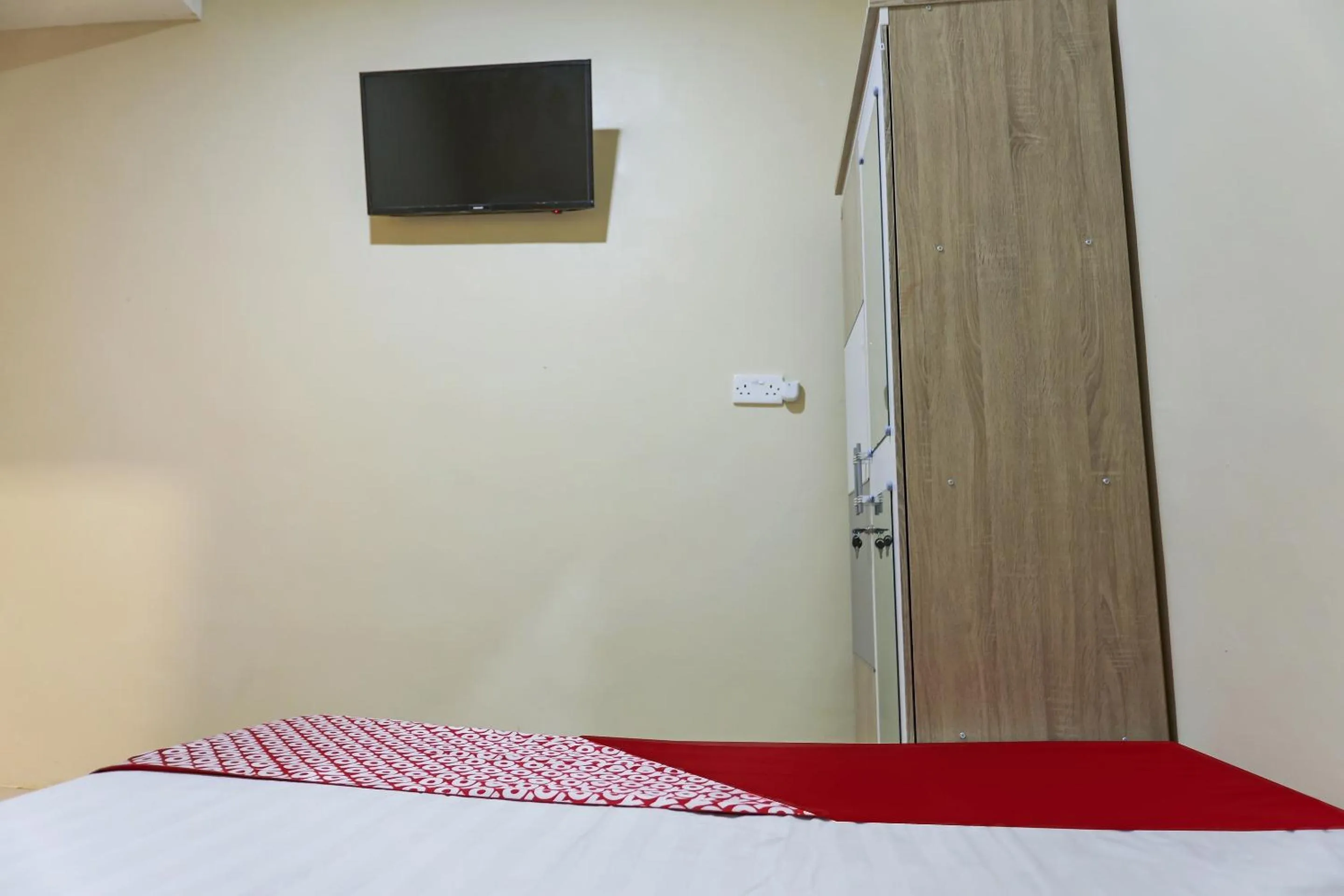 Bedroom in Hotel O X2 Homestay