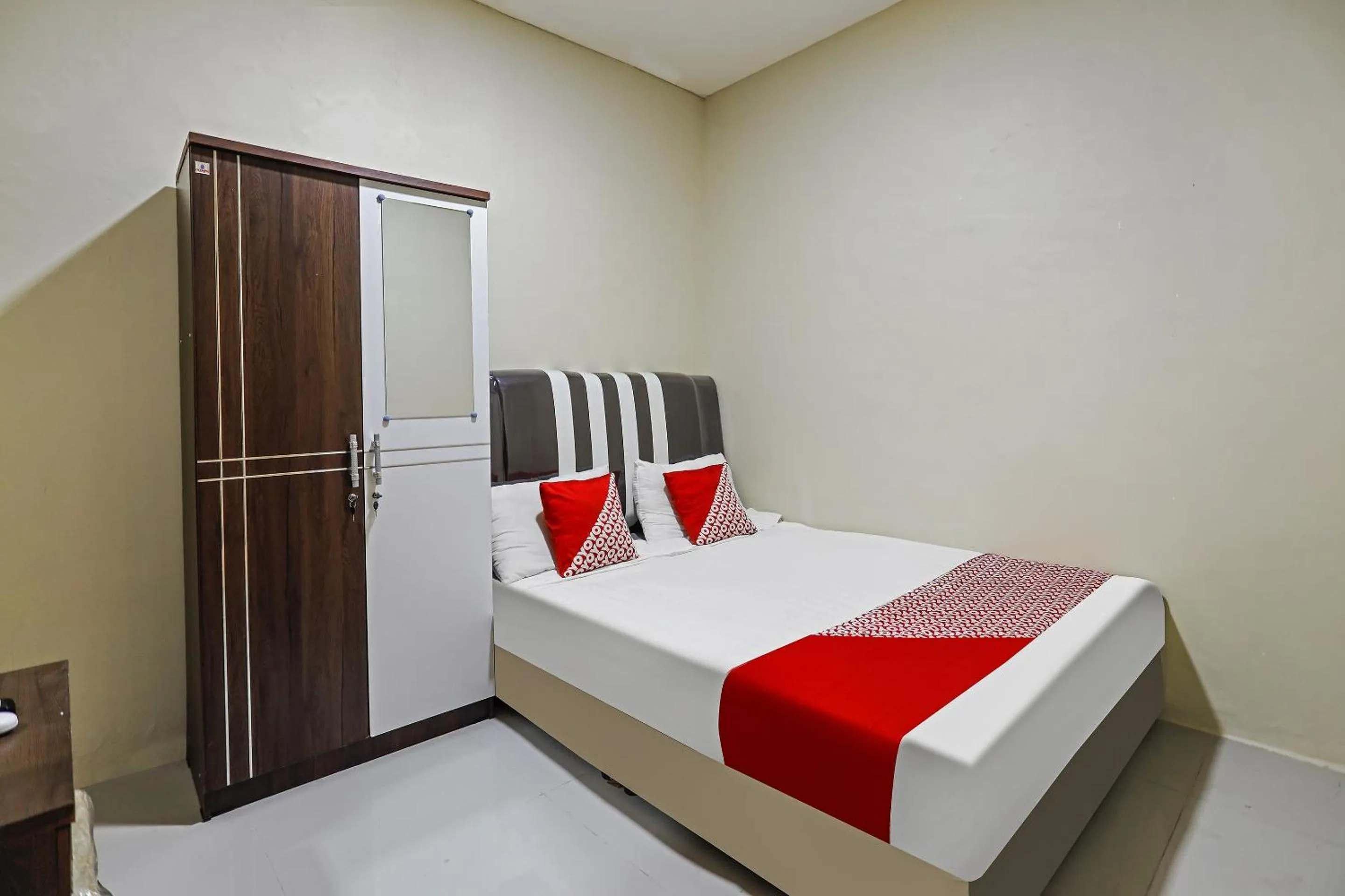 Bedroom in Hotel O X2 Homestay