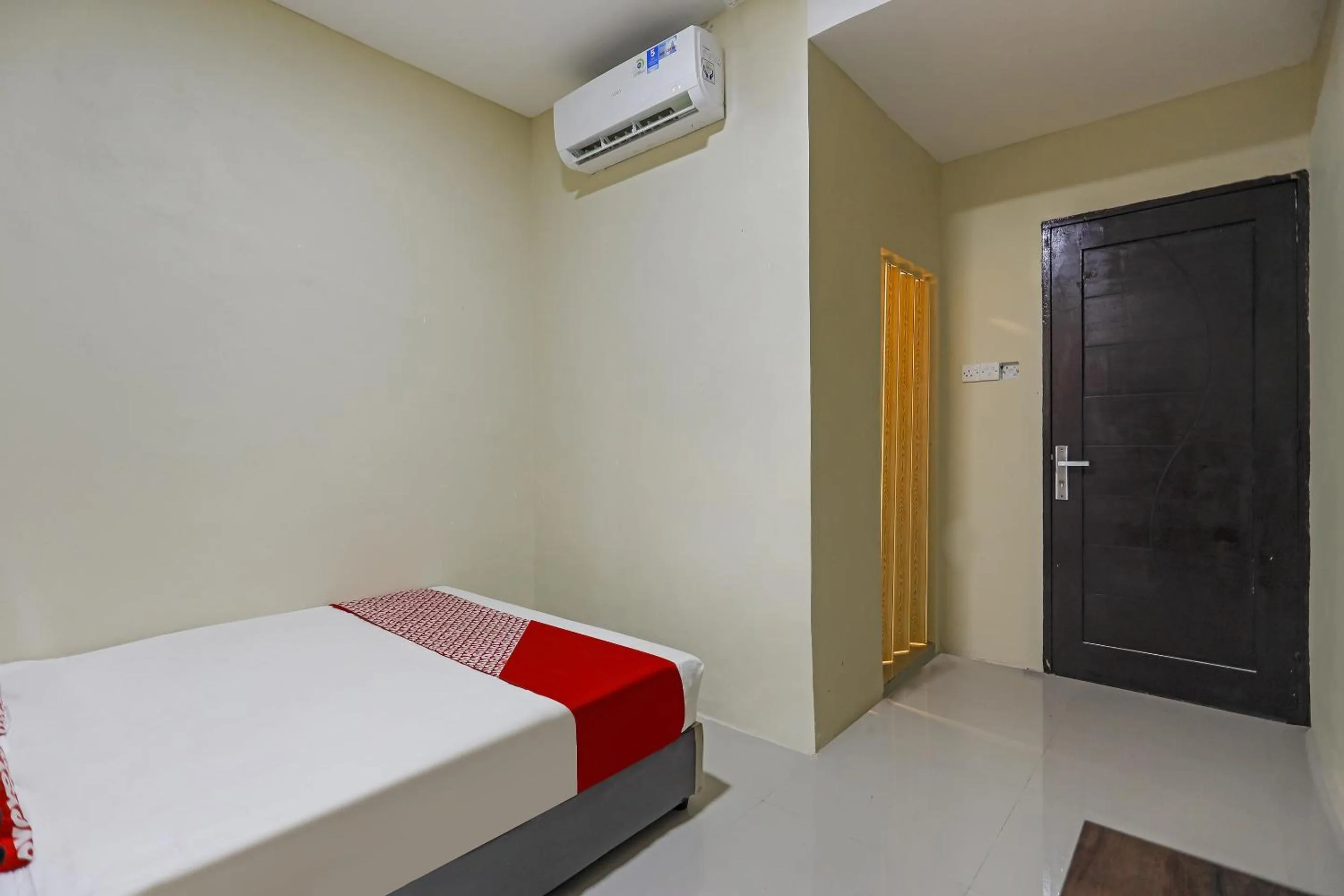 Bedroom in Hotel O X2 Homestay