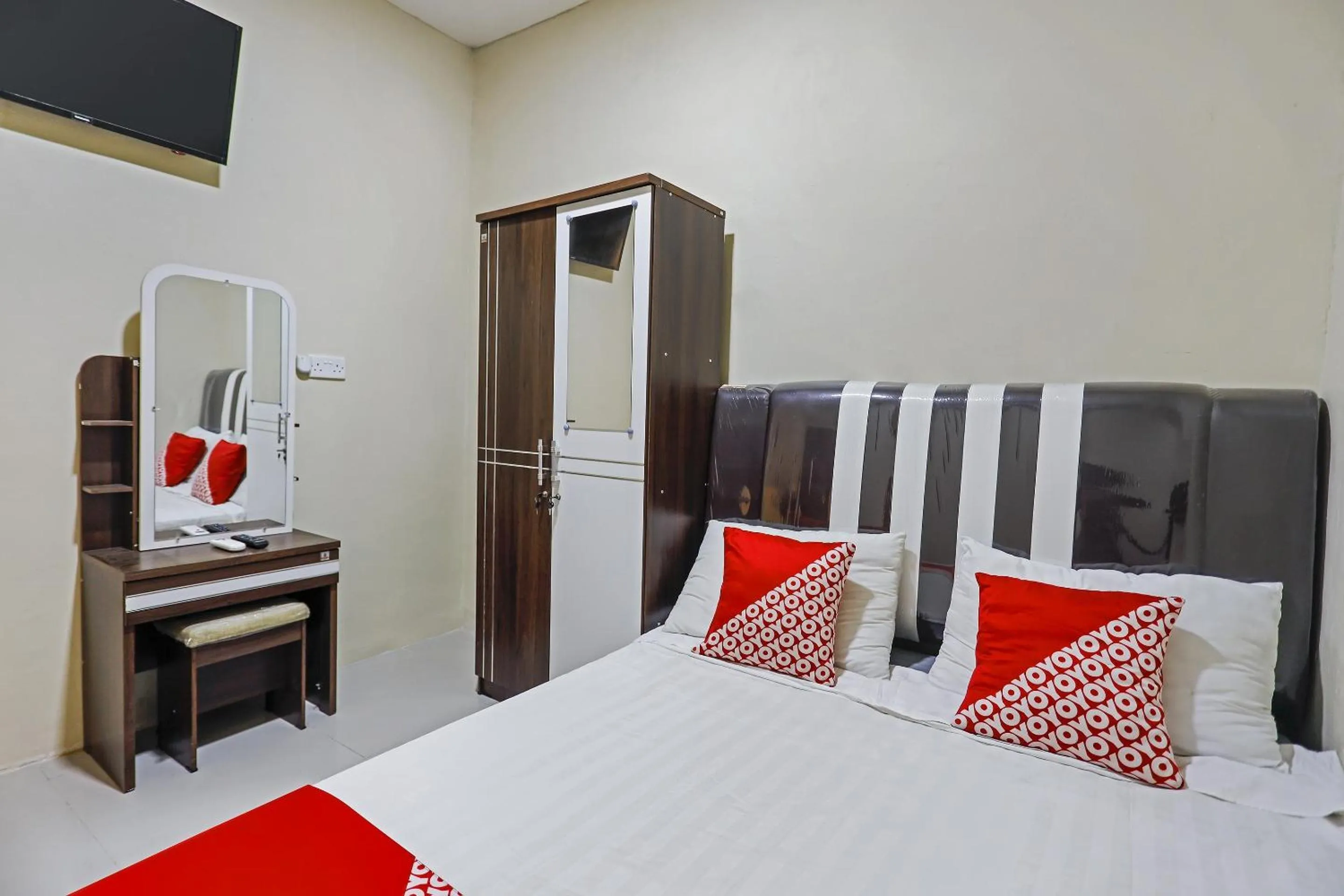 Bedroom in Hotel O X2 Homestay