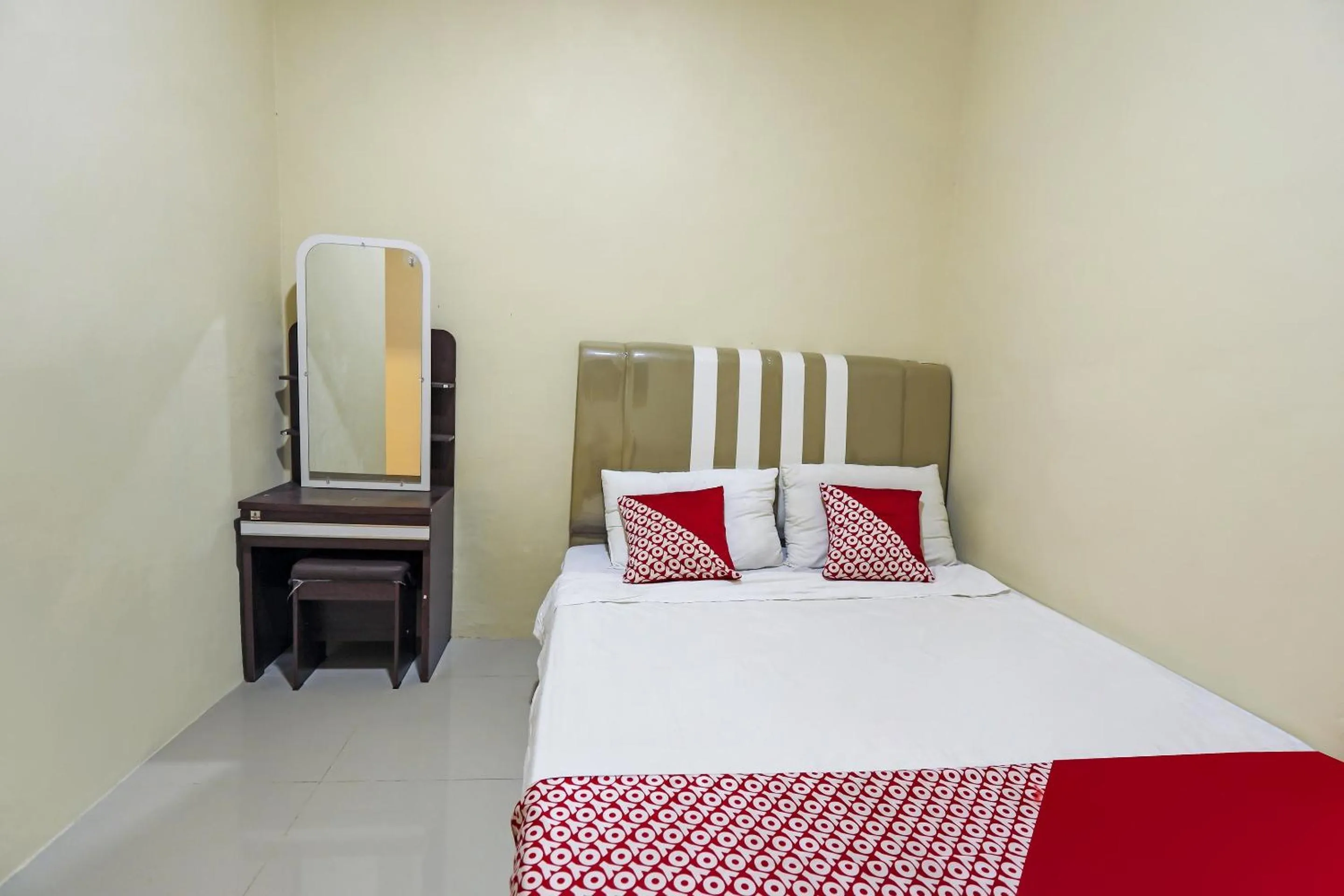 Bedroom in Hotel O X2 Homestay