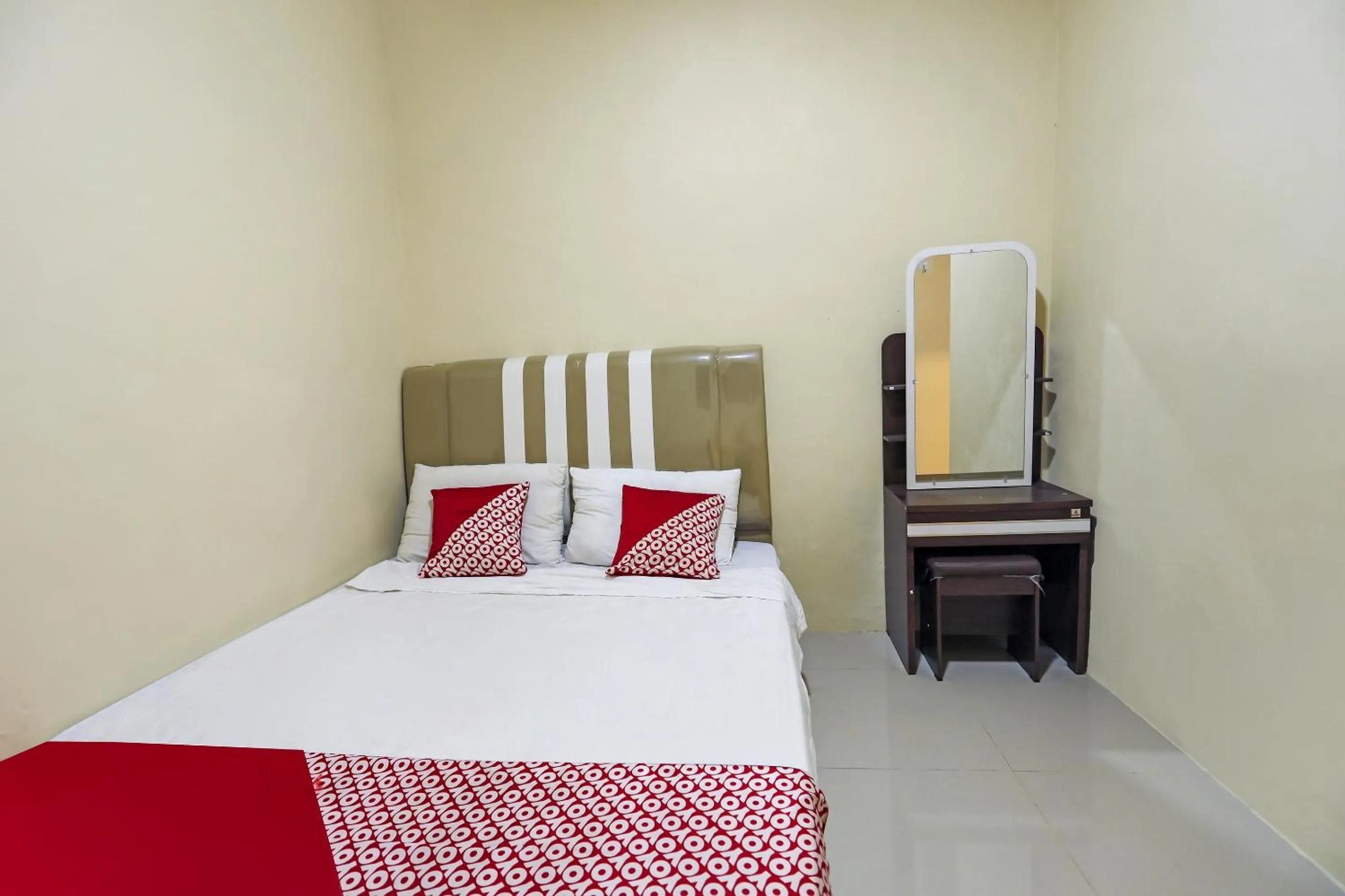 Bedroom in Hotel O X2 Homestay