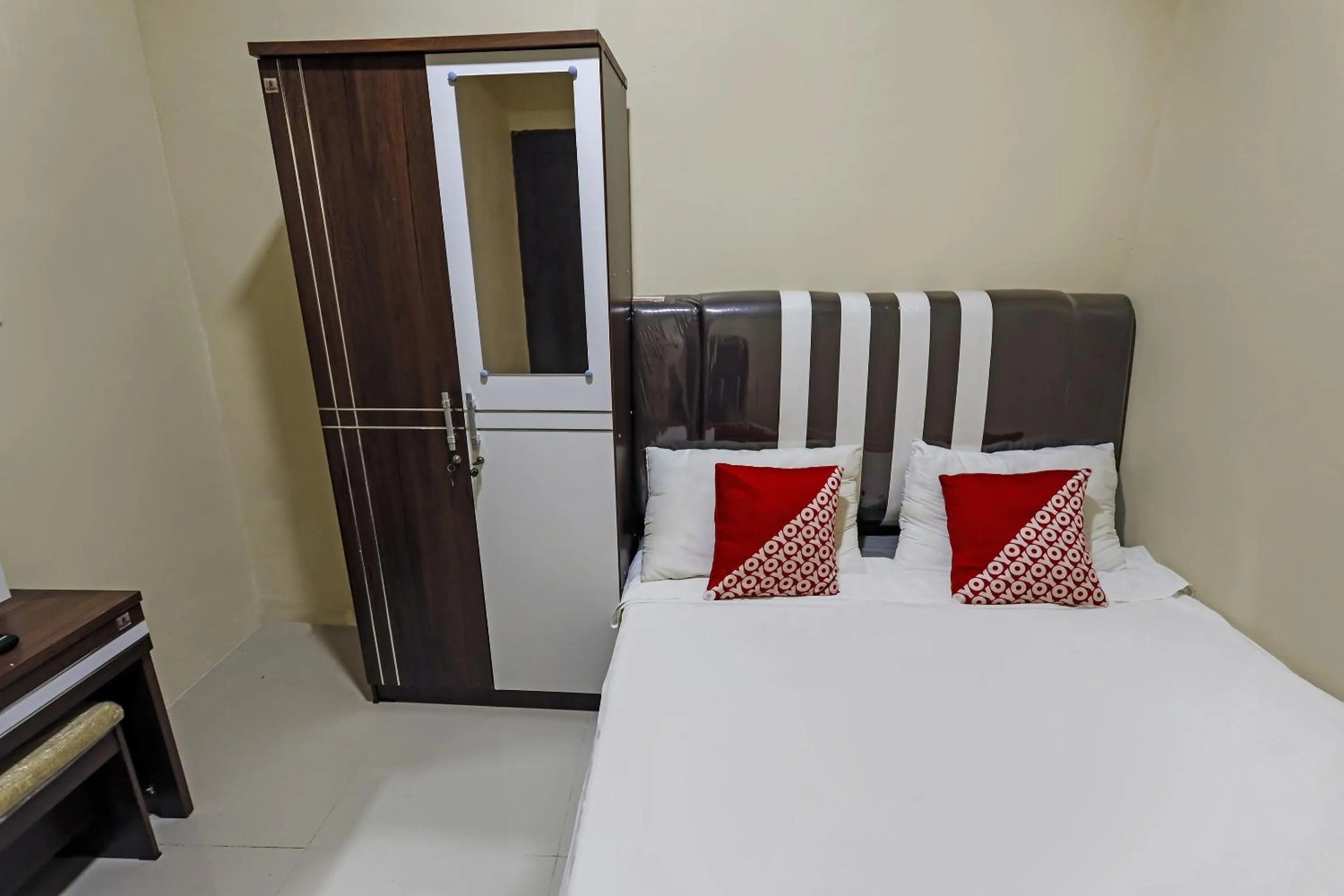 Bedroom in Hotel O X2 Homestay