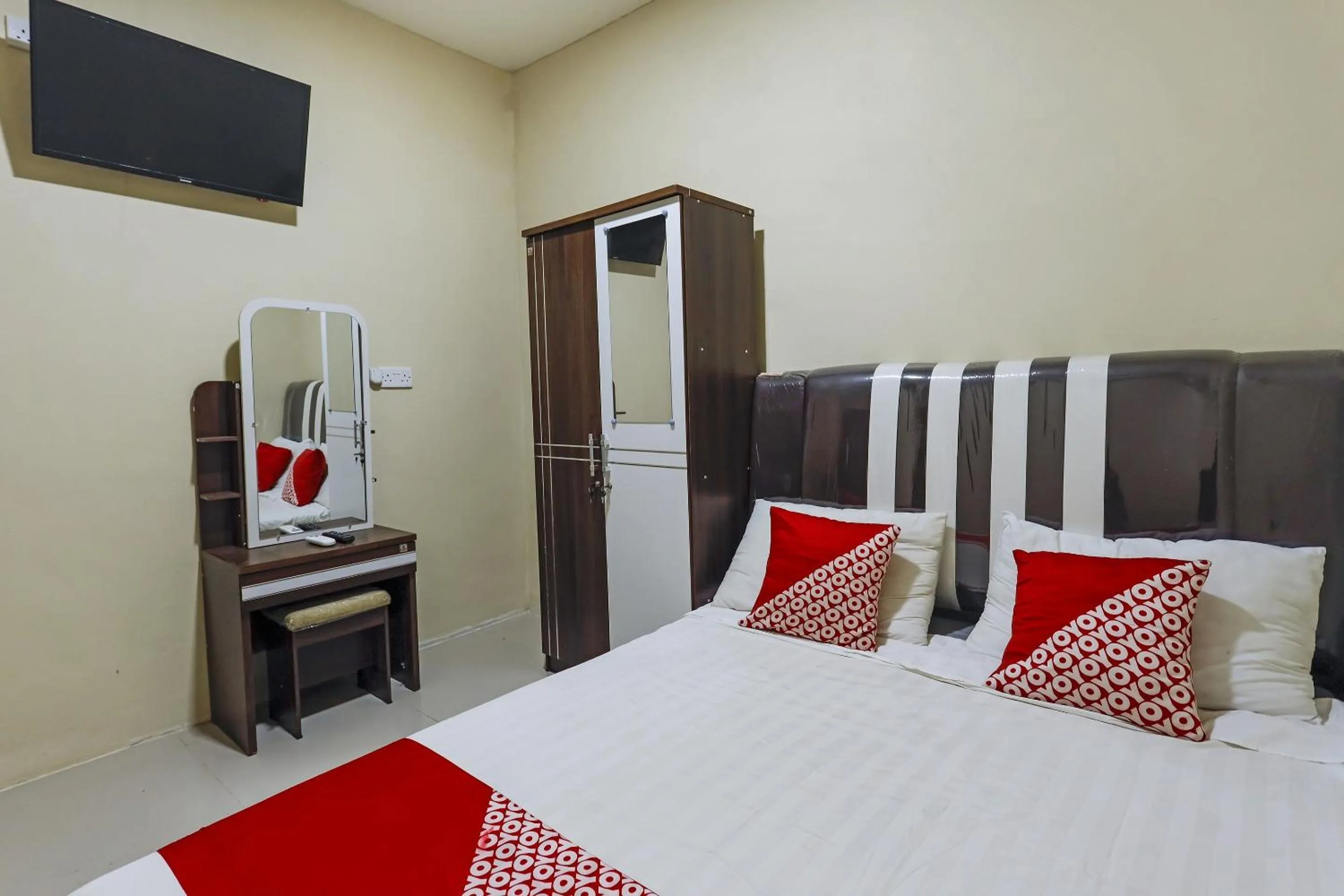 Bedroom in Hotel O X2 Homestay