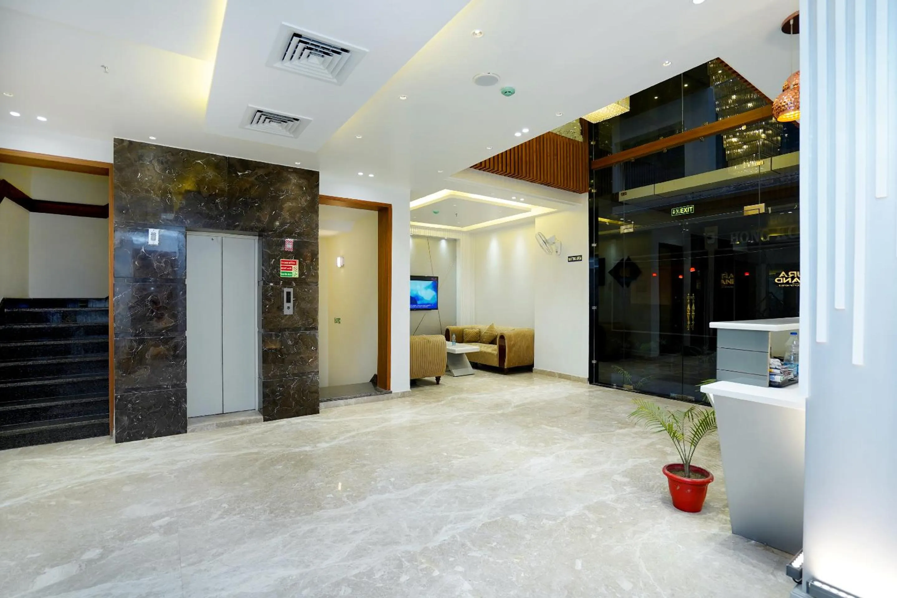 elevator in Hotel Aura Grand By Levelup Hotels