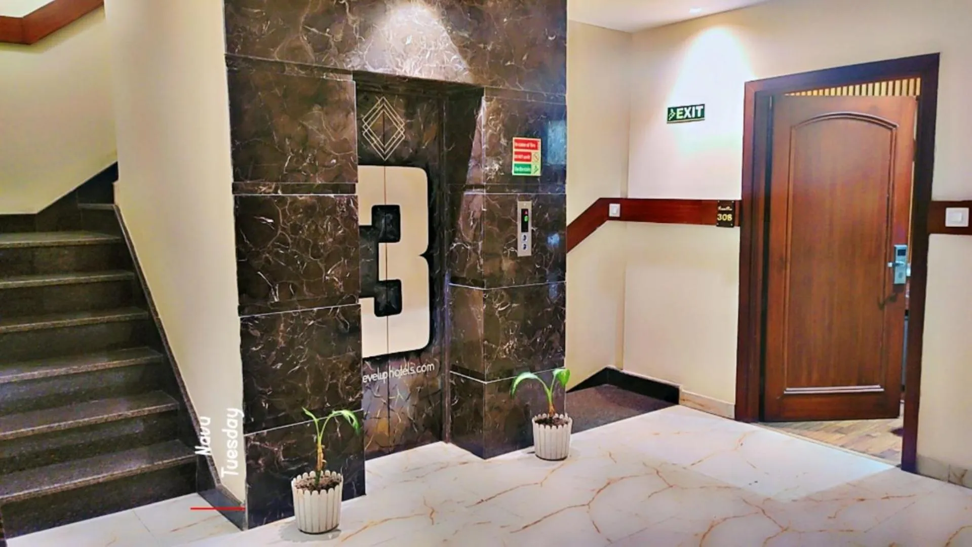 elevator in Hotel Aura Grand By Levelup Hotels