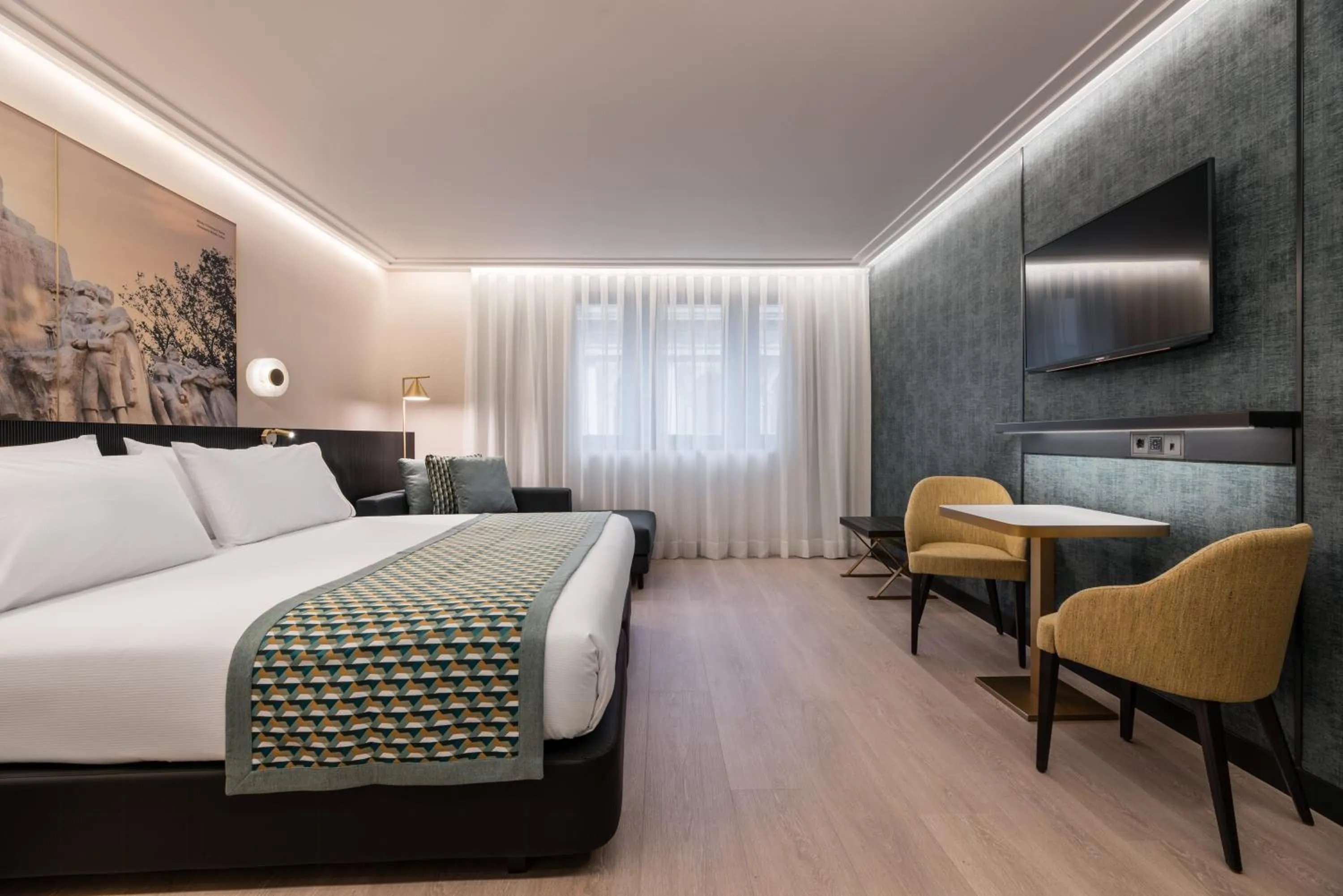 Bed in Eurostars Ambassador