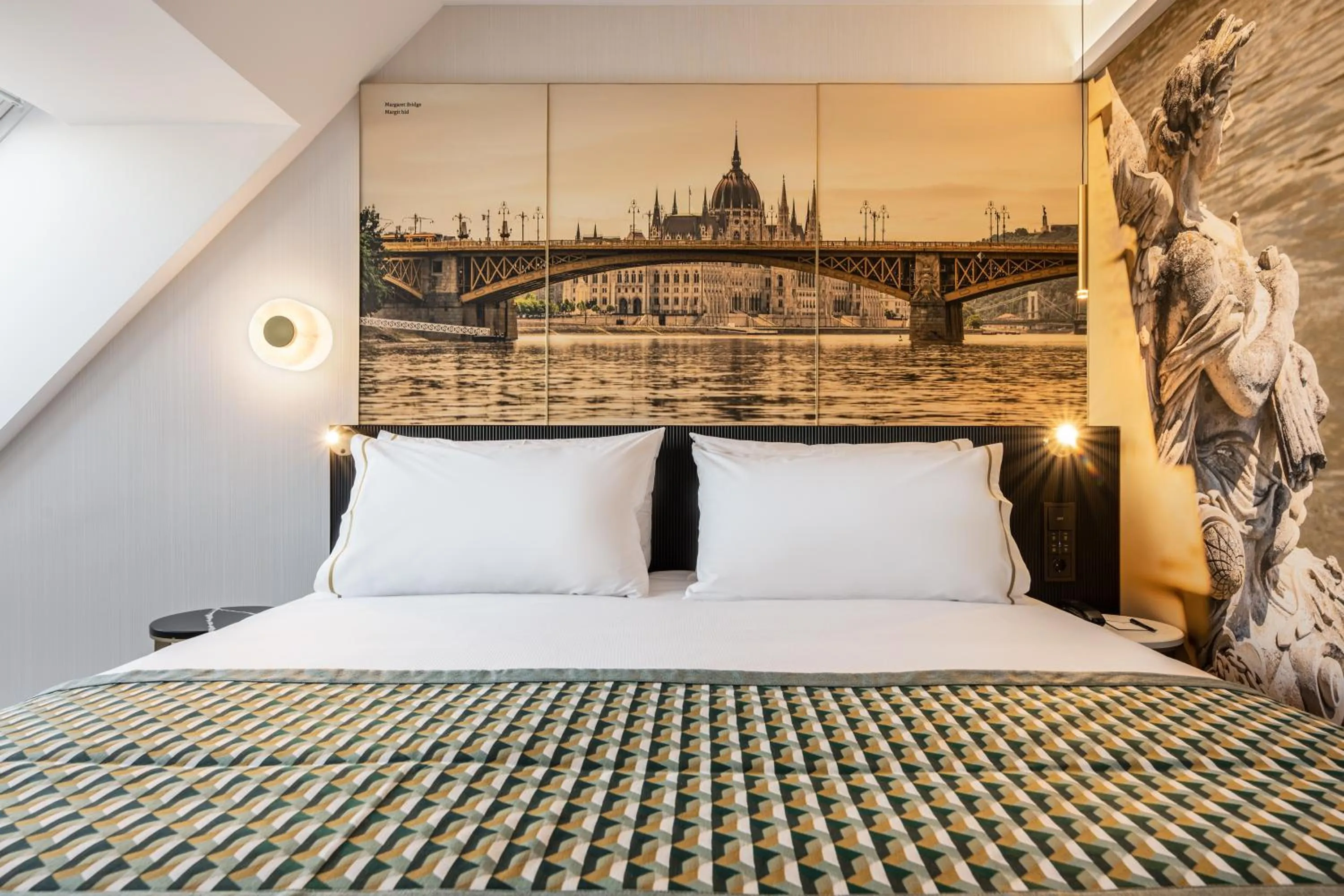 Bed in Eurostars Ambassador