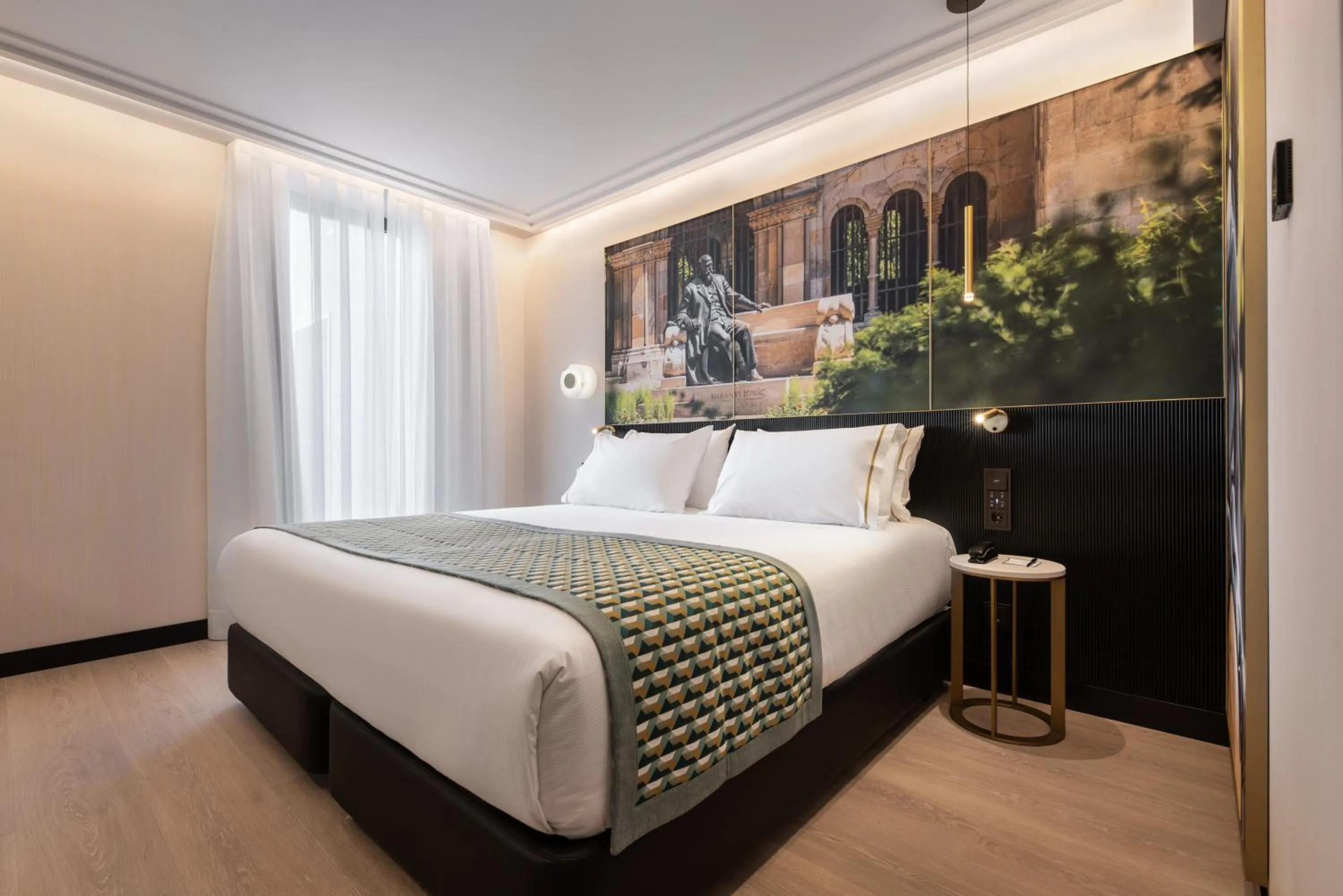 Bed in Eurostars Ambassador