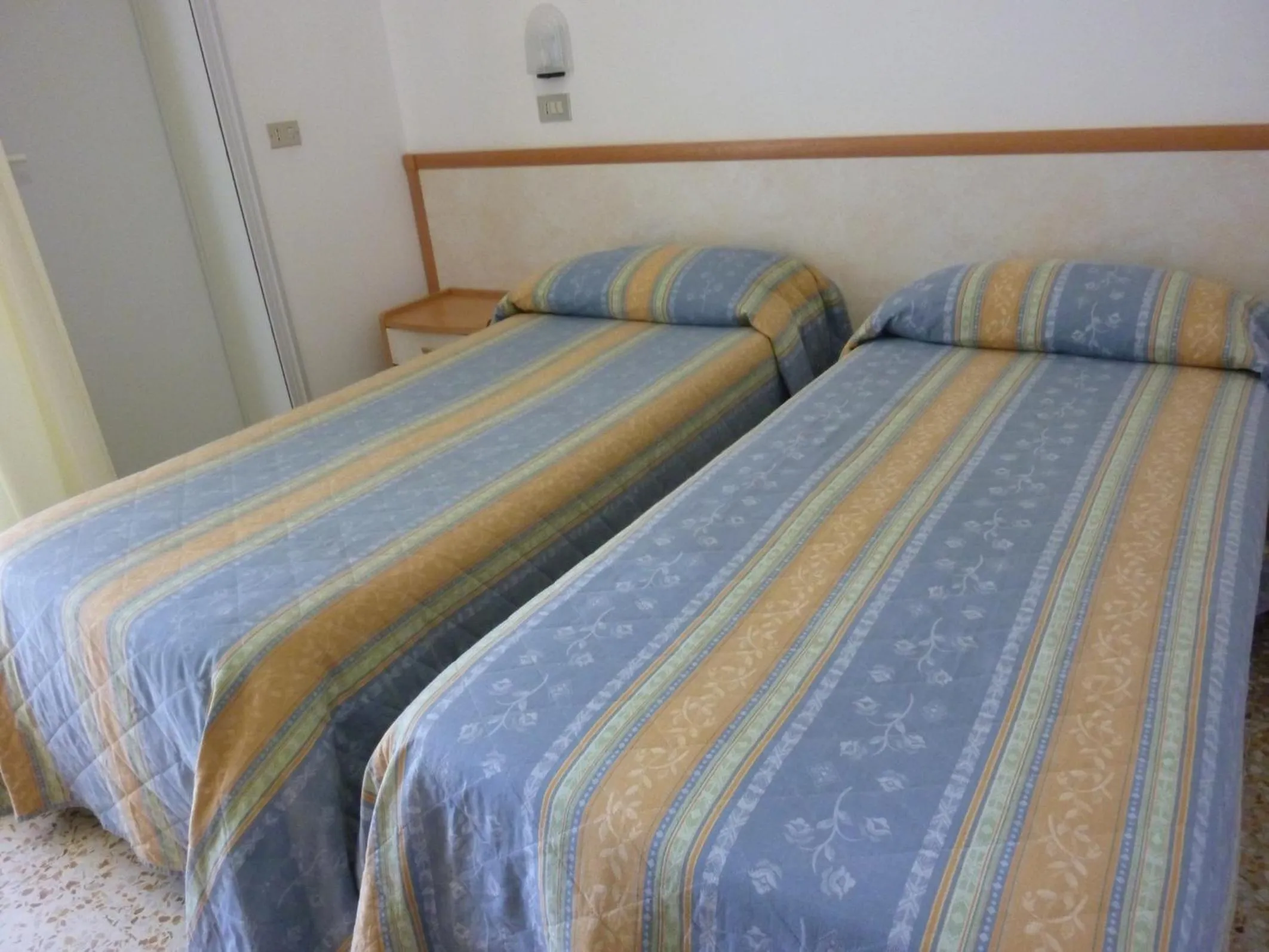 Bed in Hotel Apis