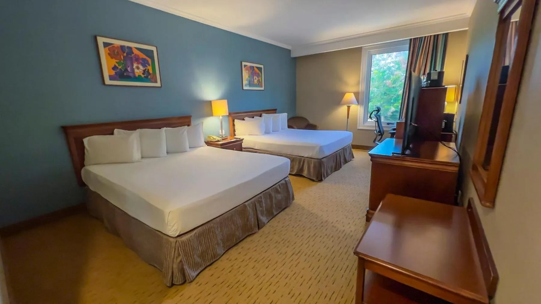 Communal lounge/ TV room, Bed in Eurobuilding Express El Tigre