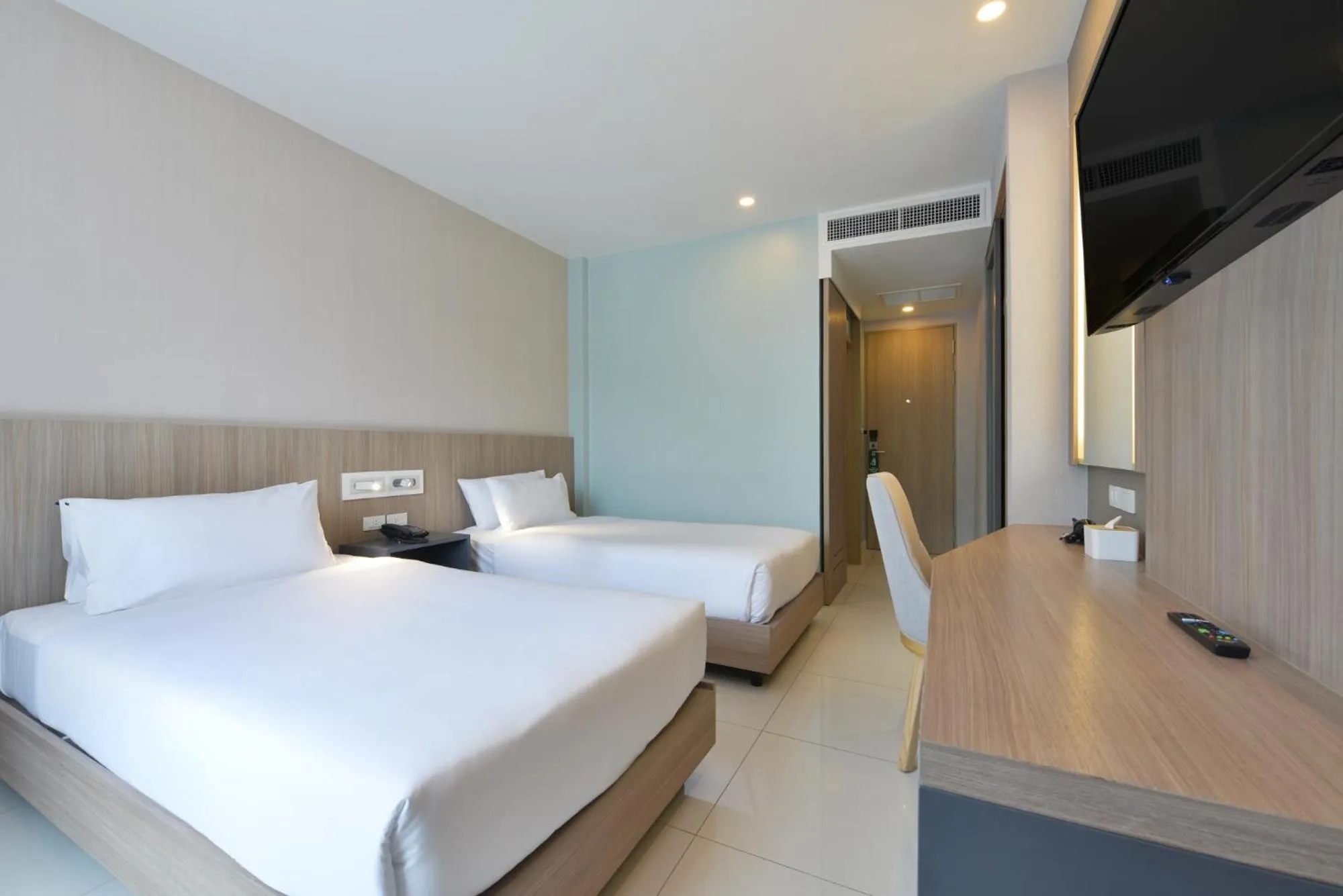 Bed in Grace Patong Hotel