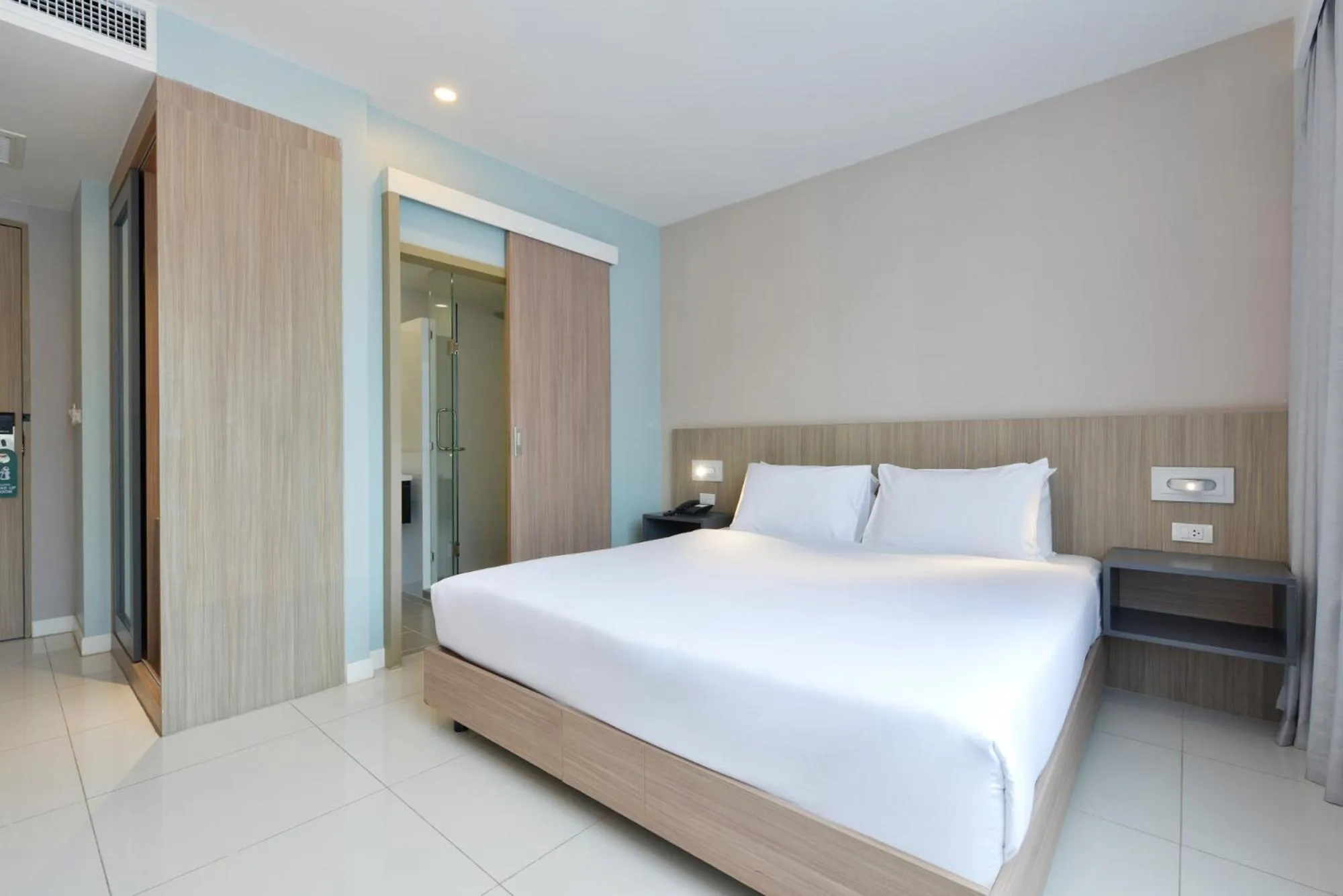 Bed in Grace Patong Hotel