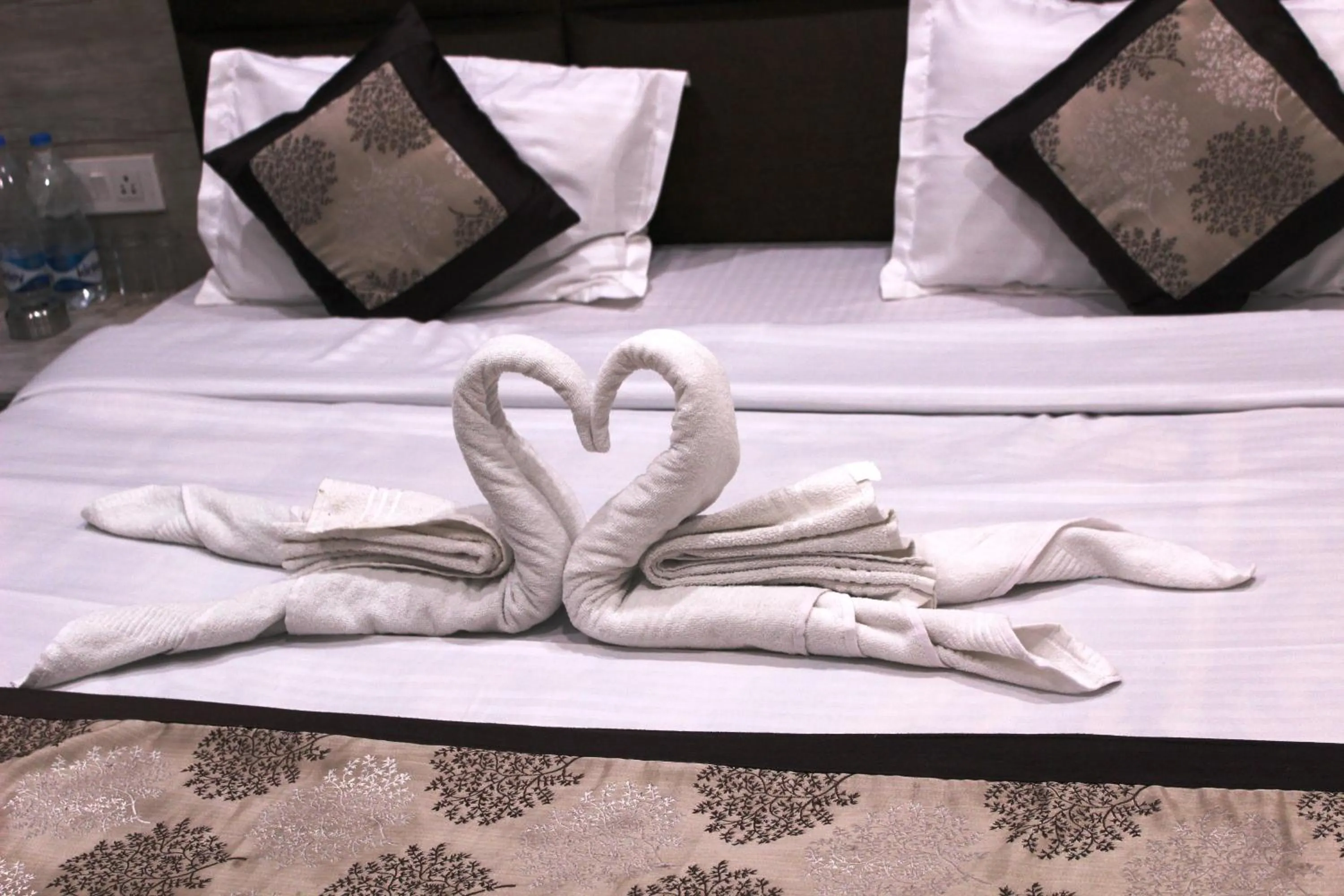 Bed in Shree Krishna Hotels