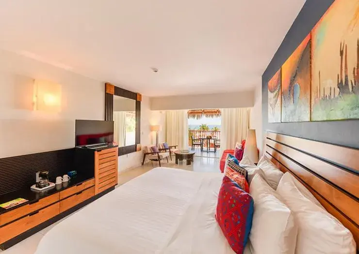 Bed in Grand Decameron Los Cabos, A Trademark All-Inclusive Resort Bed in Grand Decameron Los Cabos, A Trademark All-Inclusive Resort
