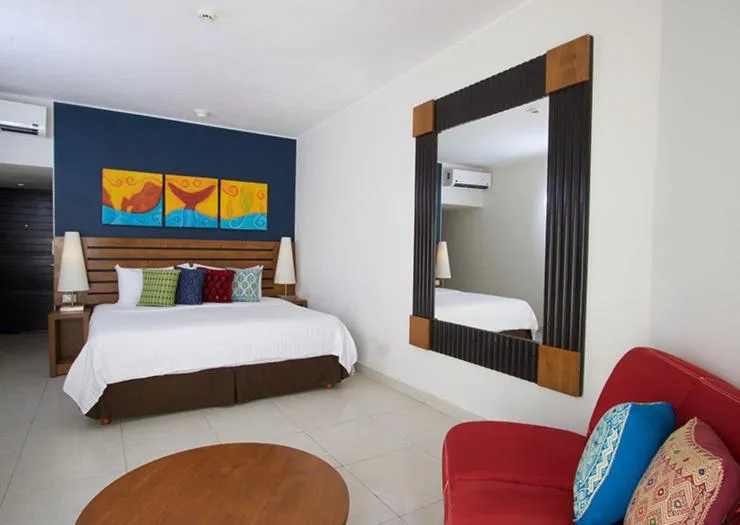 Bed in Grand Decameron Los Cabos, A Trademark All-Inclusive Resort