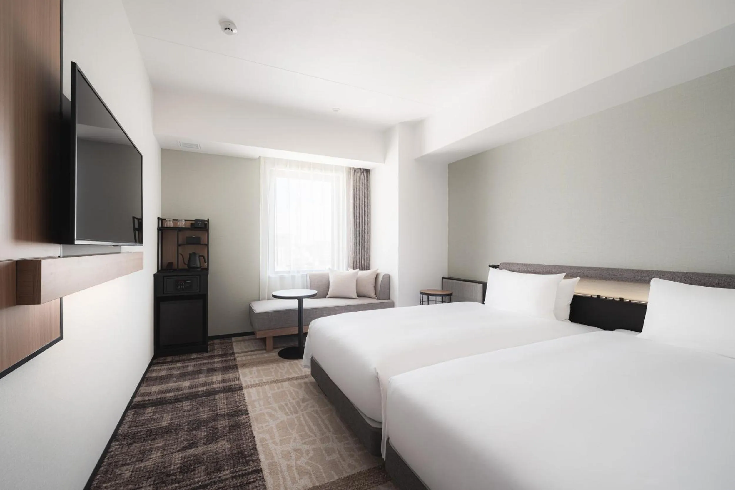 Photo of the whole room, Bed in Nest Hotel Naha Nishi