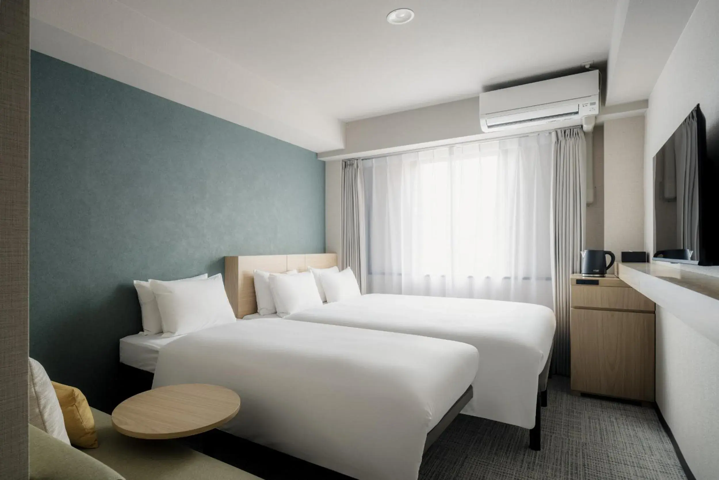 Photo of the whole room, Bed in Nest Hotel Ishigaki Maesato Beach Photo of the whole room, Bed in Nest Hotel Ishigaki Maesato Beach