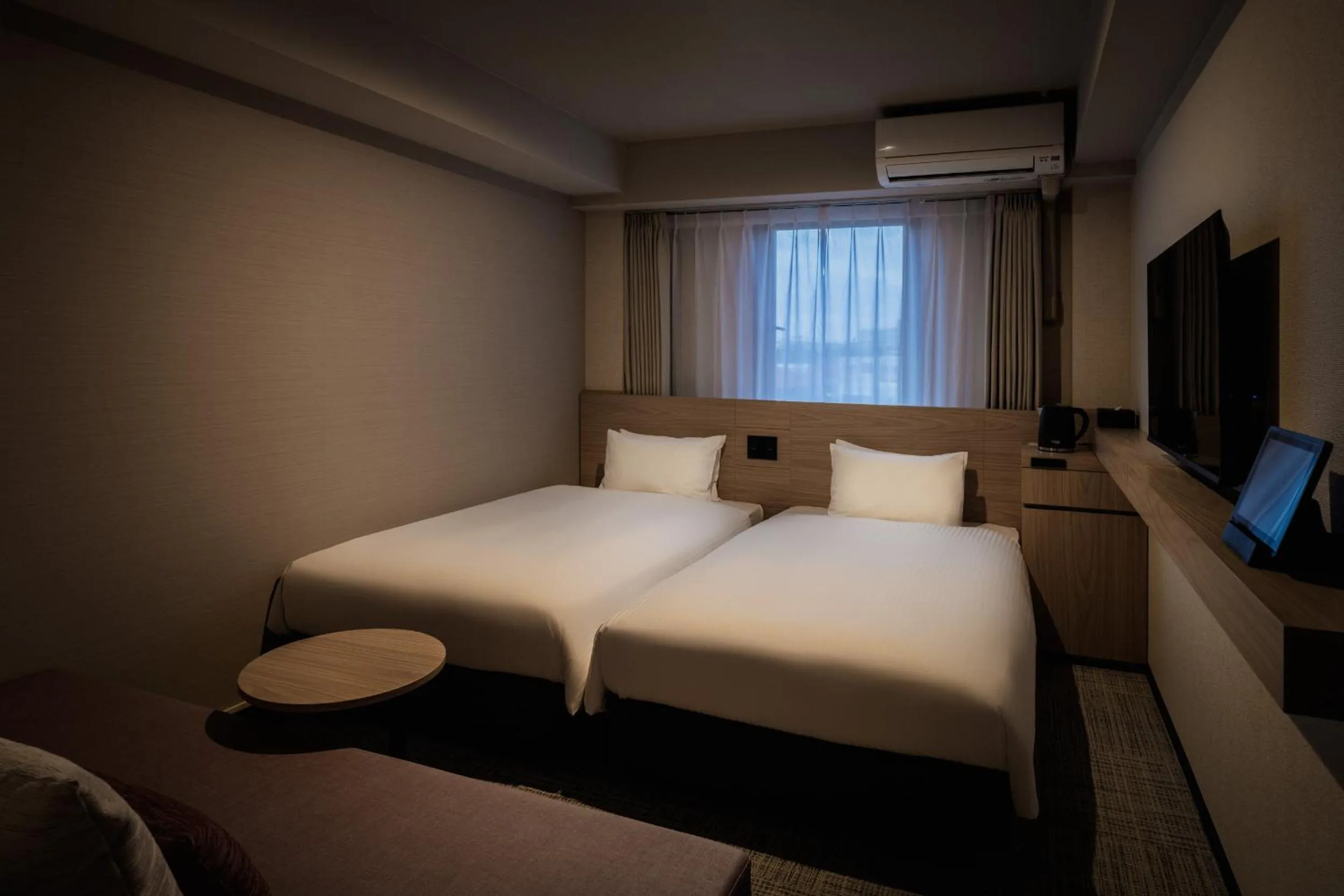 Photo of the whole room, Bed in Nest Hotel Ishigaki Maesato Beach