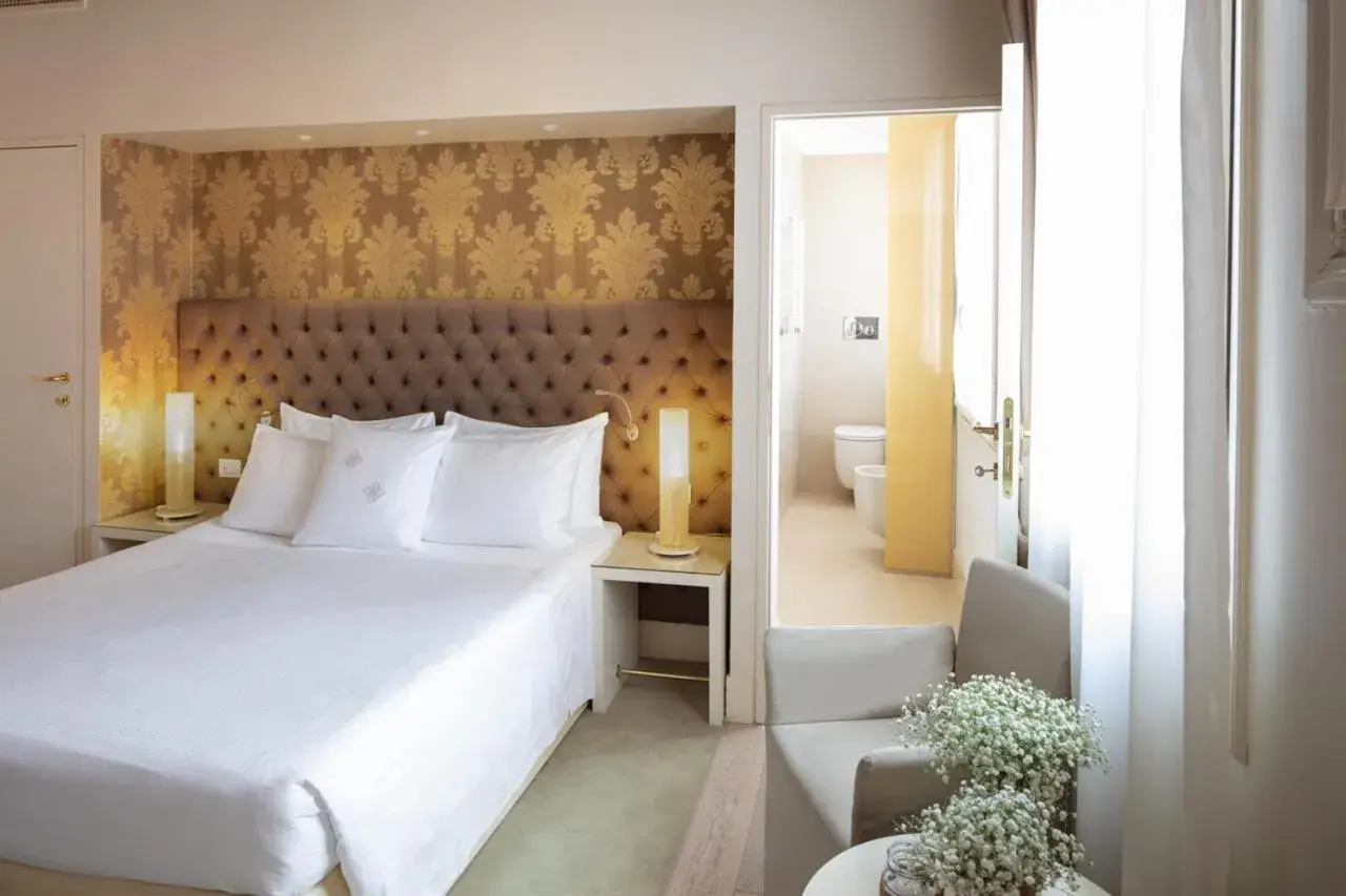 Bed in Palazzo Barocci Bed in Palazzo Barocci