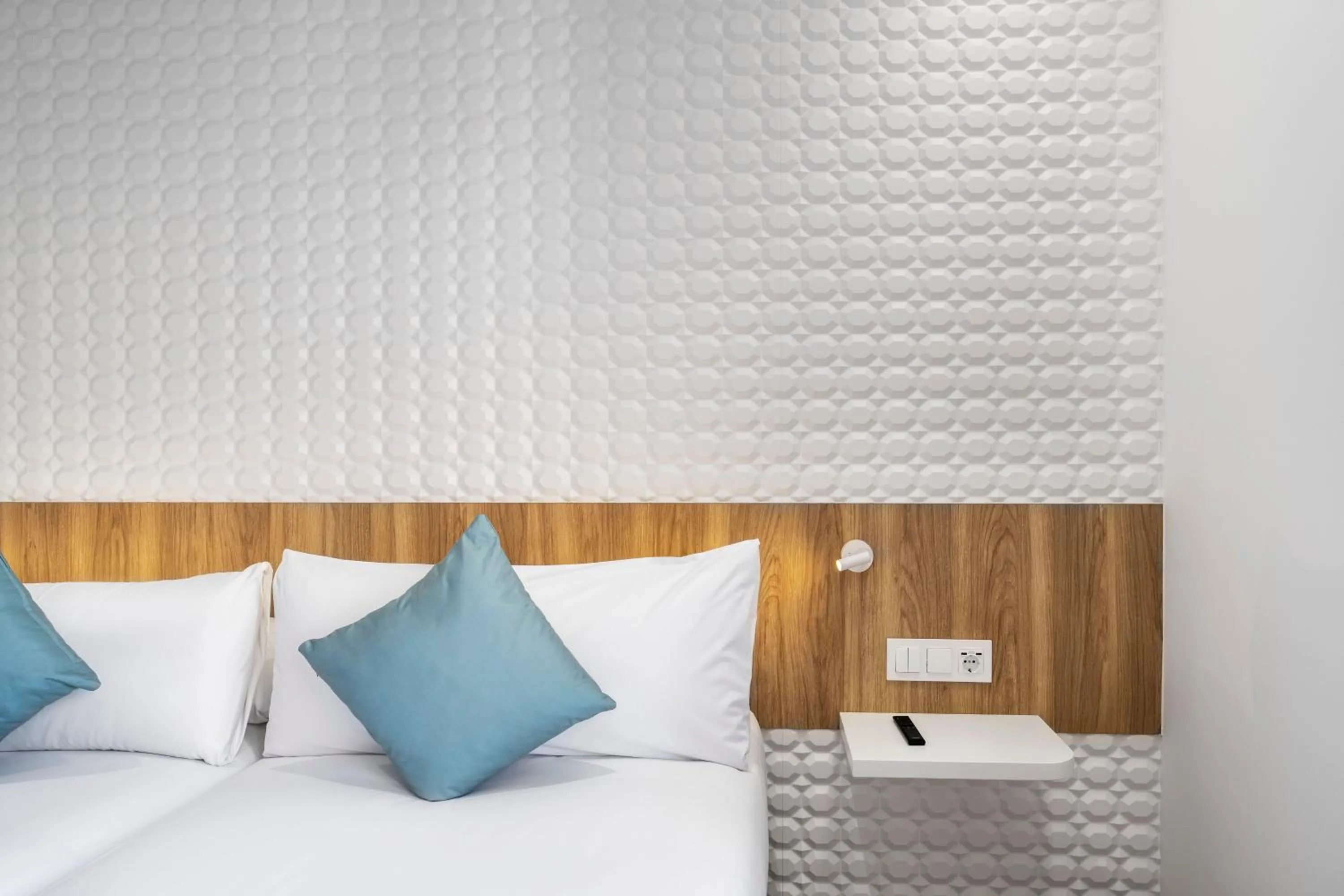 Decorative detail, Bed in Odyssey Rooms Alicante