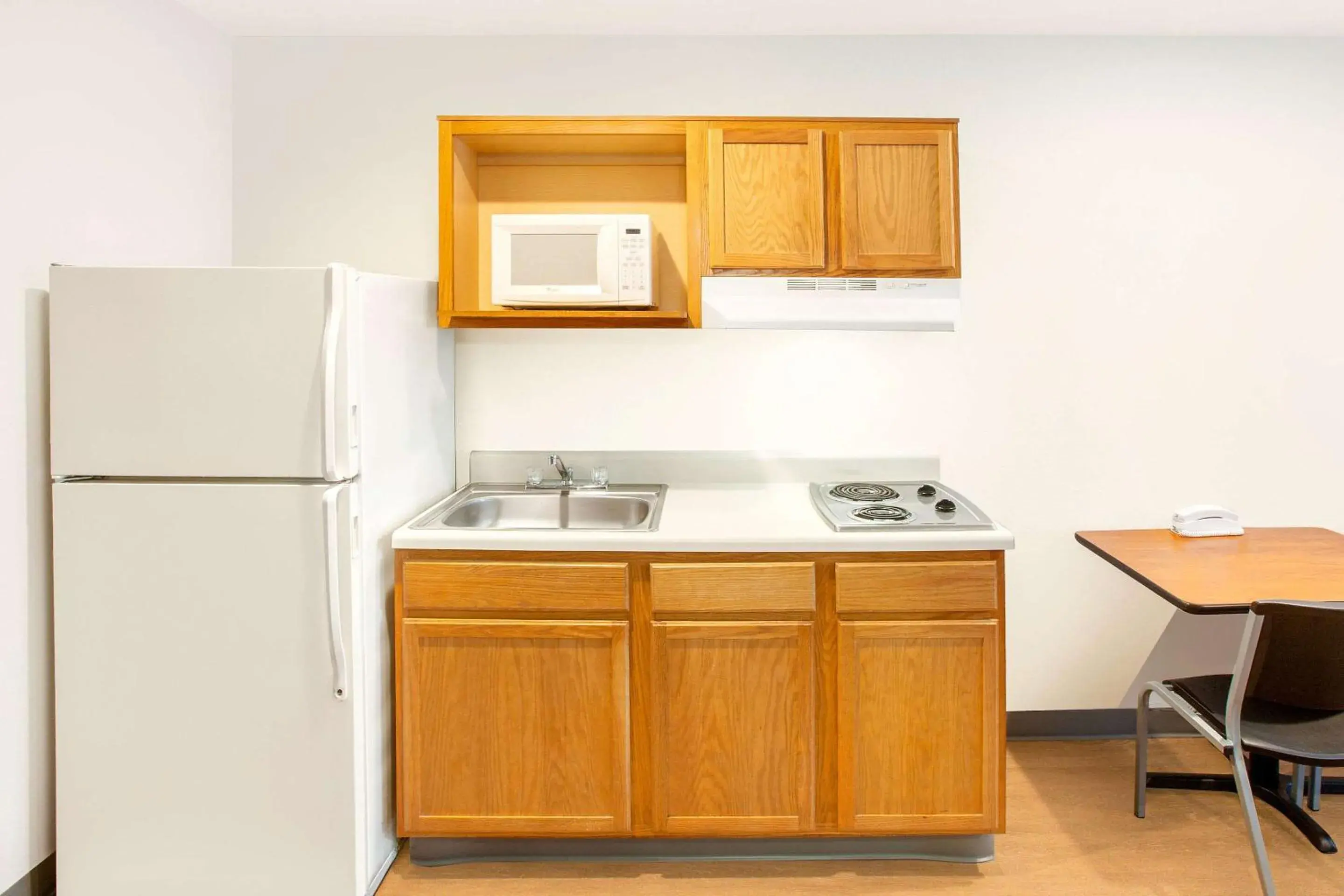 Kitchen or kitchenette in WoodSpring Suites Pharr Kitchen or kitchenette in WoodSpring Suites Pharr
