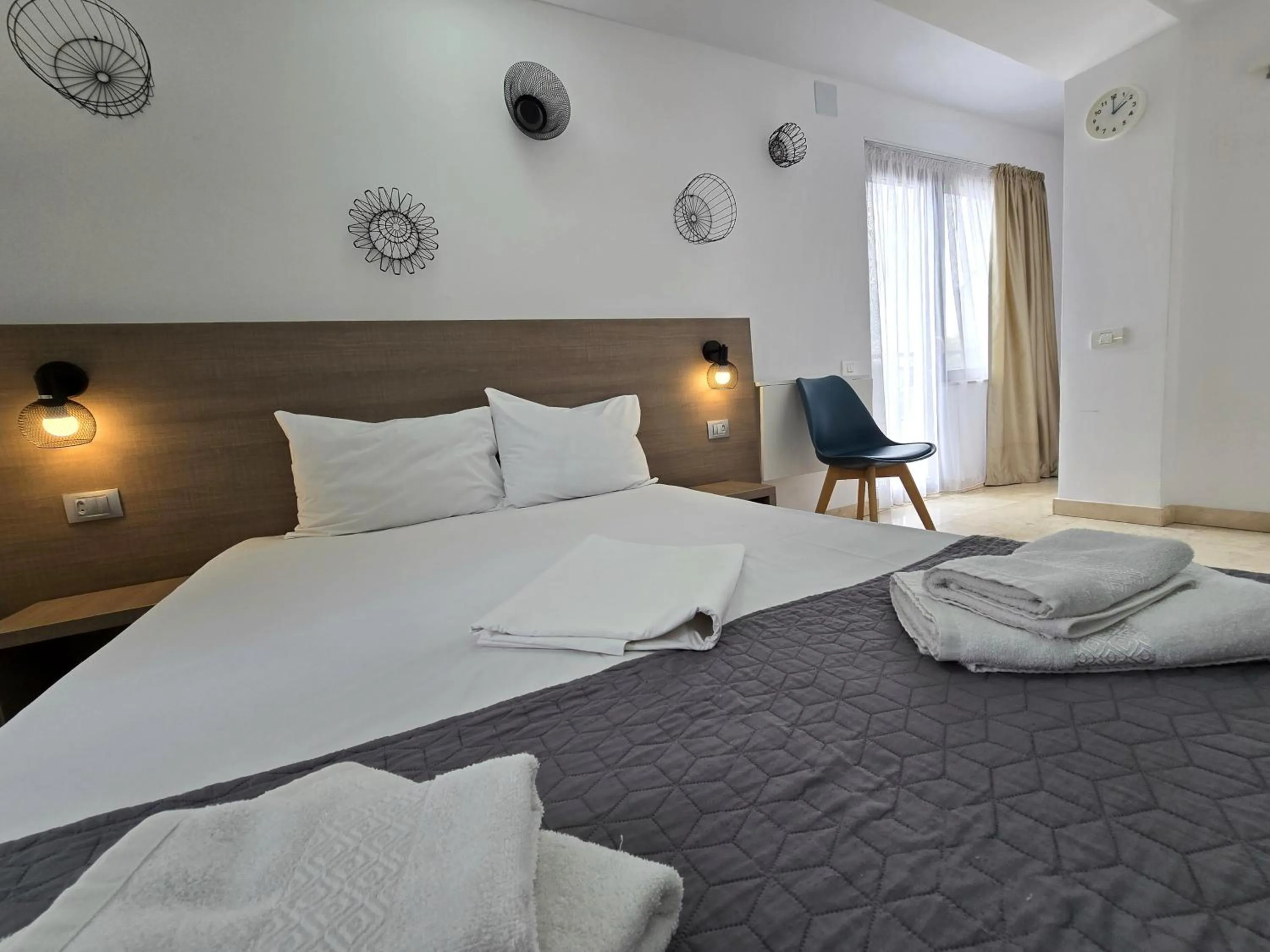 Bed in Dacia Residence Apartments