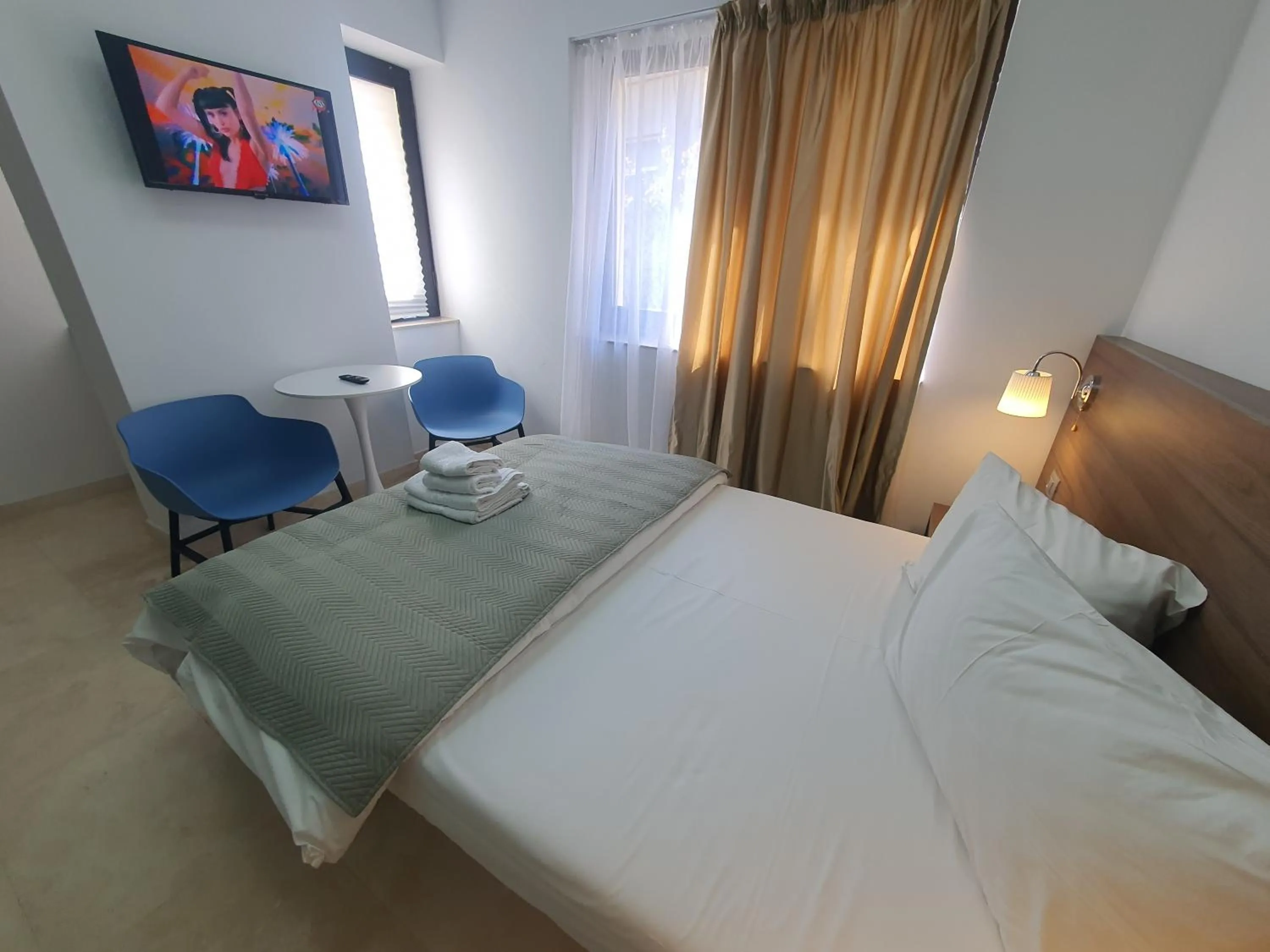 Bed in Dacia Residence Apartments