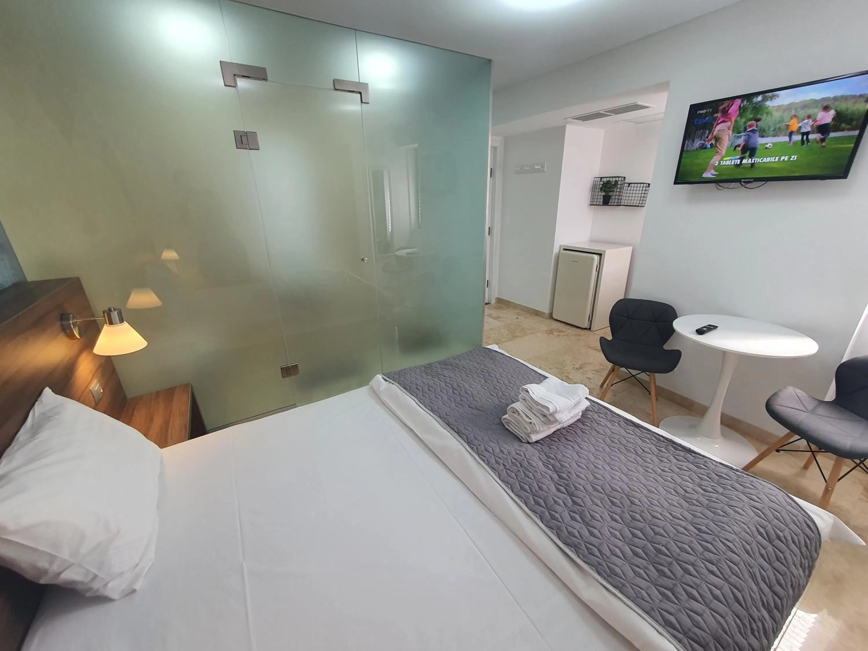 Bed in Dacia Residence Apartments