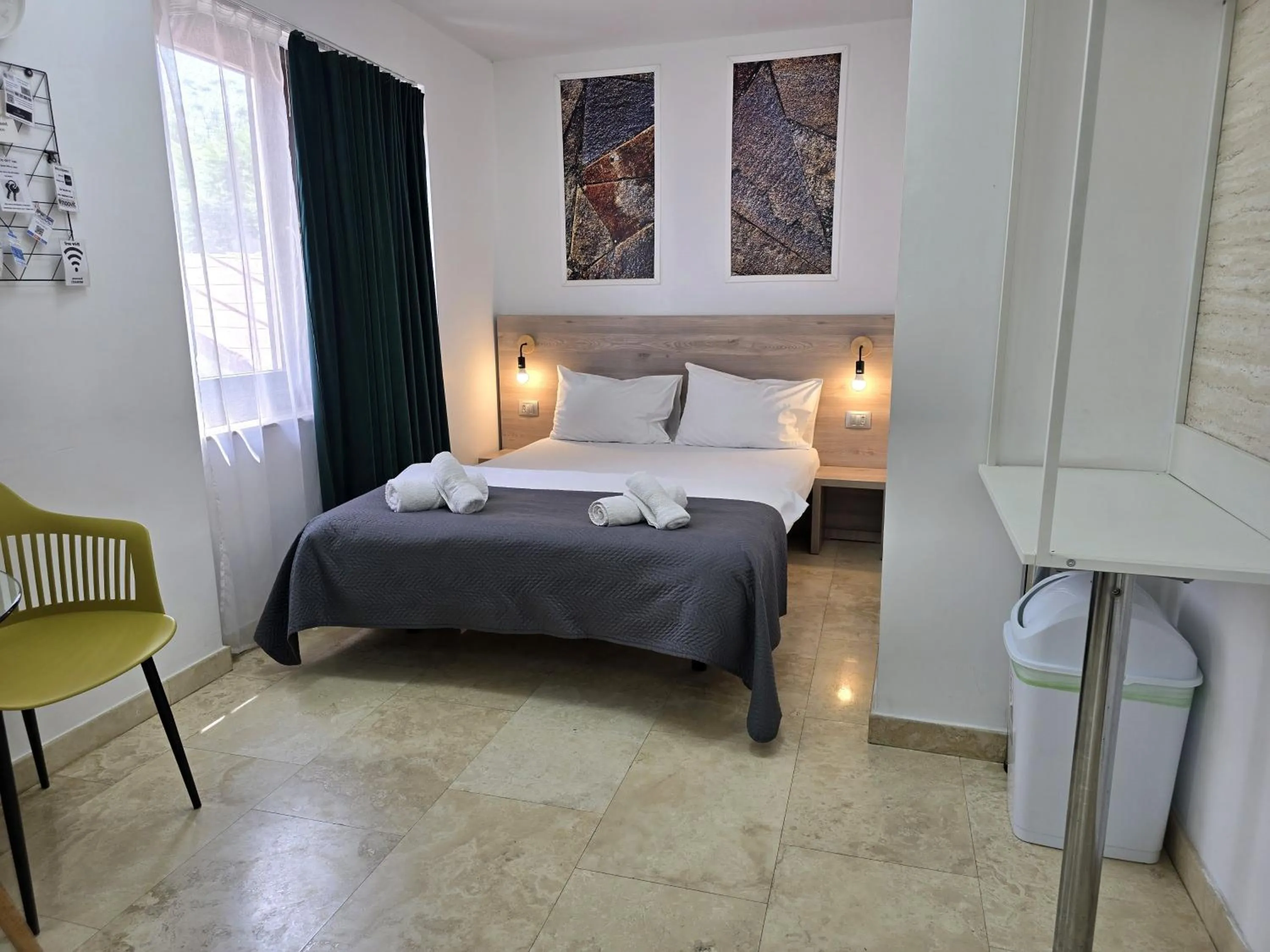 Bed in Dacia Residence Apartments