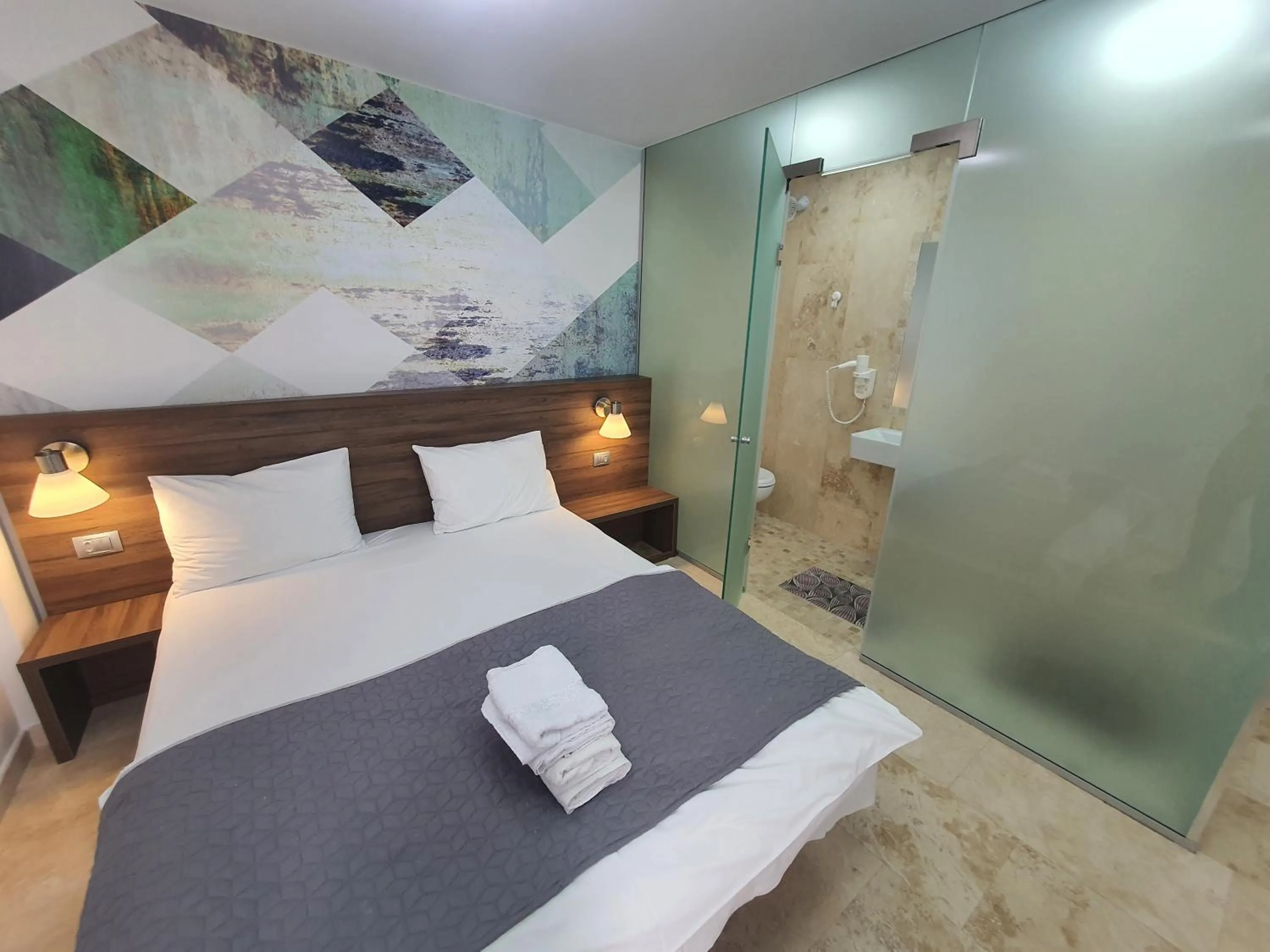 Bed in Dacia Residence Apartments