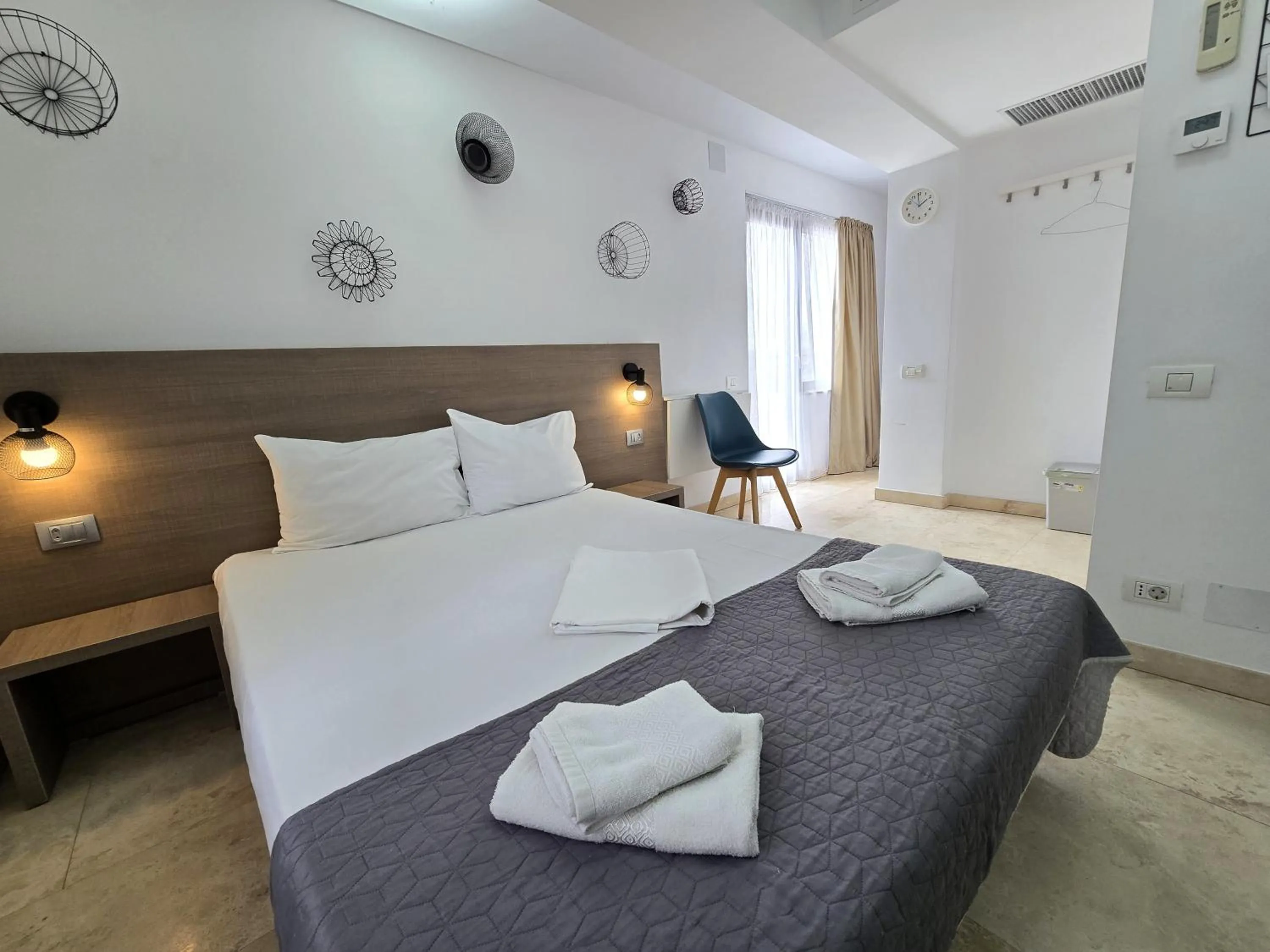 Bed in Dacia Residence Apartments