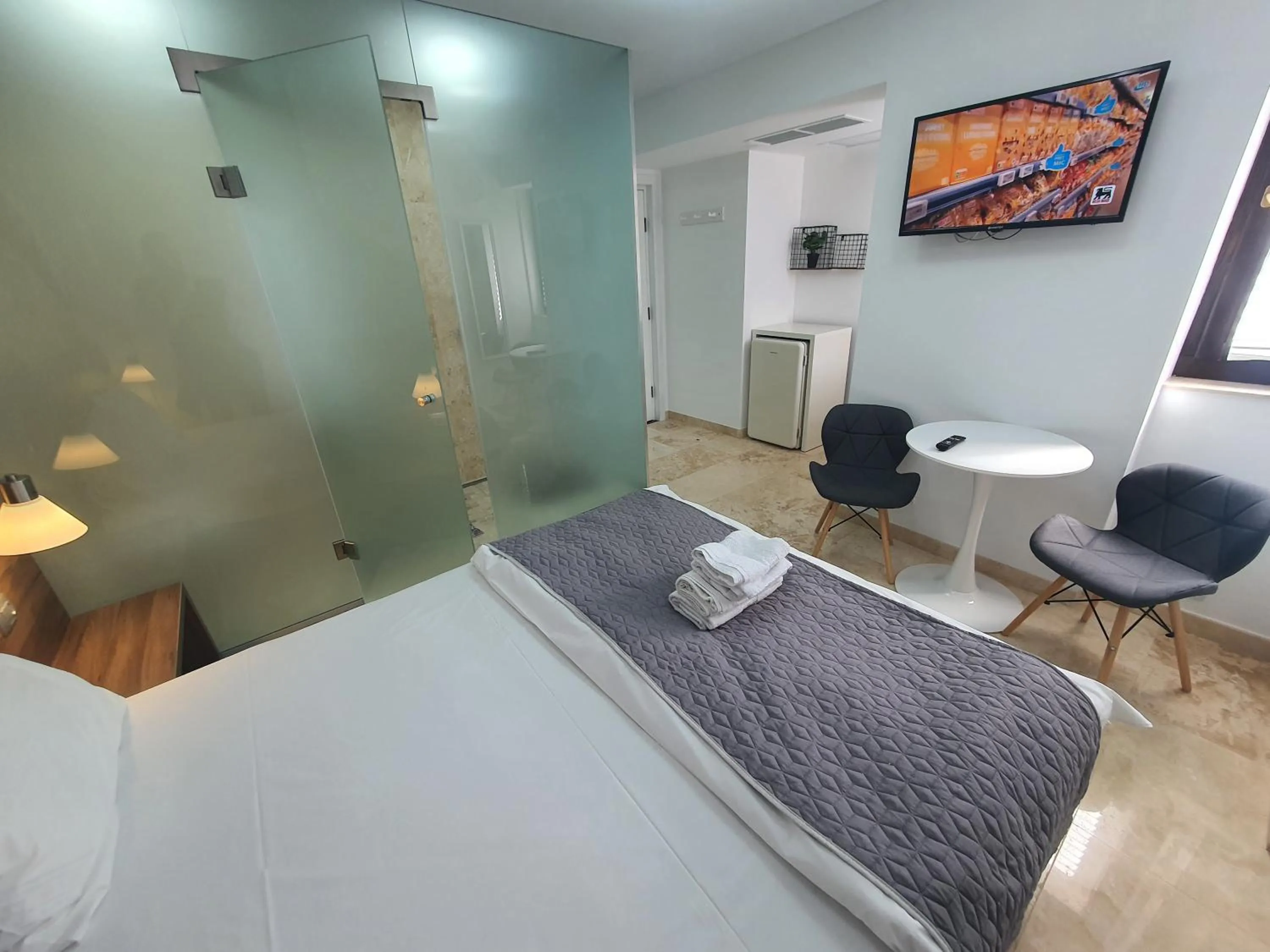 Bed in Dacia Residence Apartments