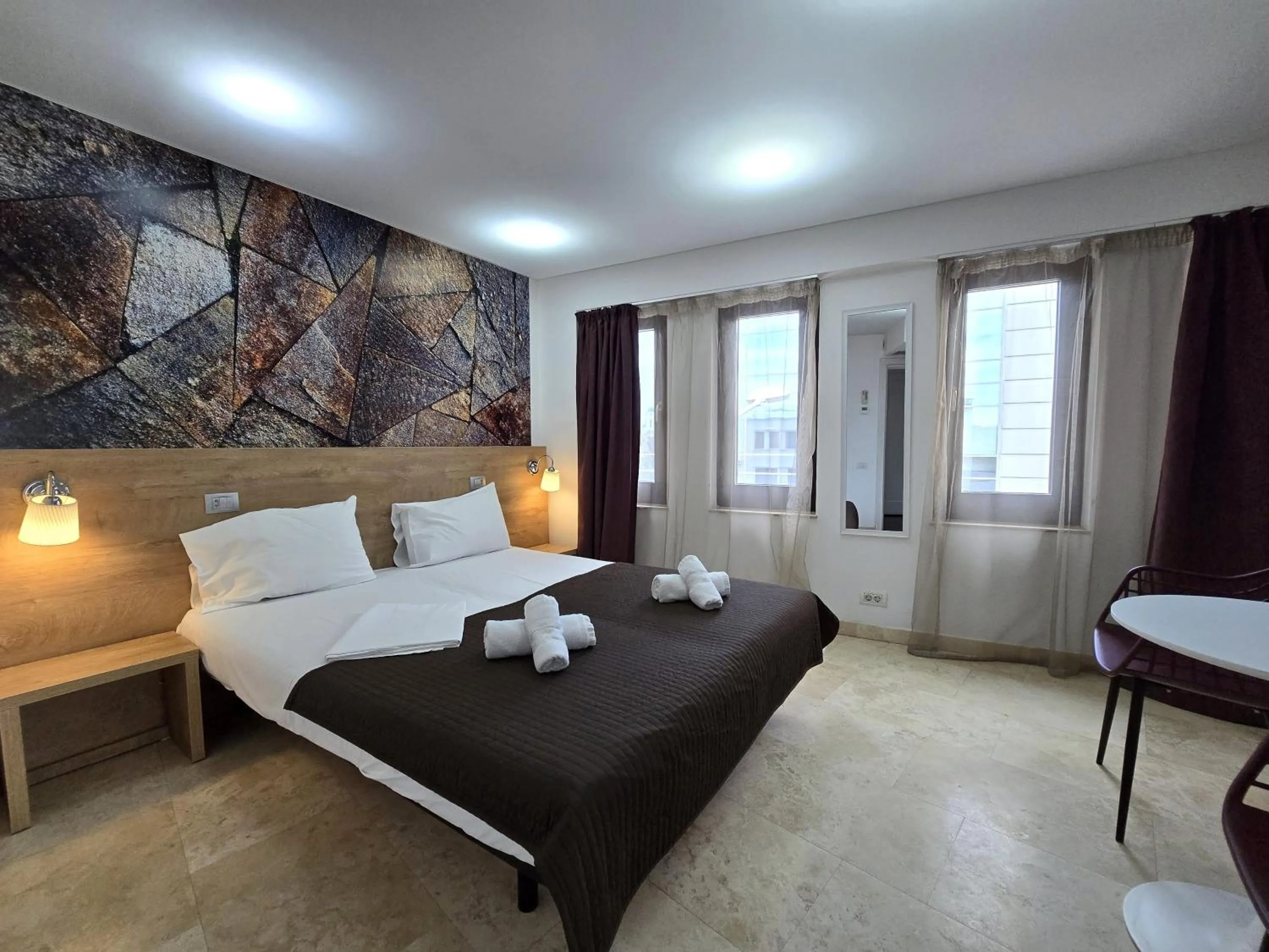 Bed in Dacia Residence Apartments