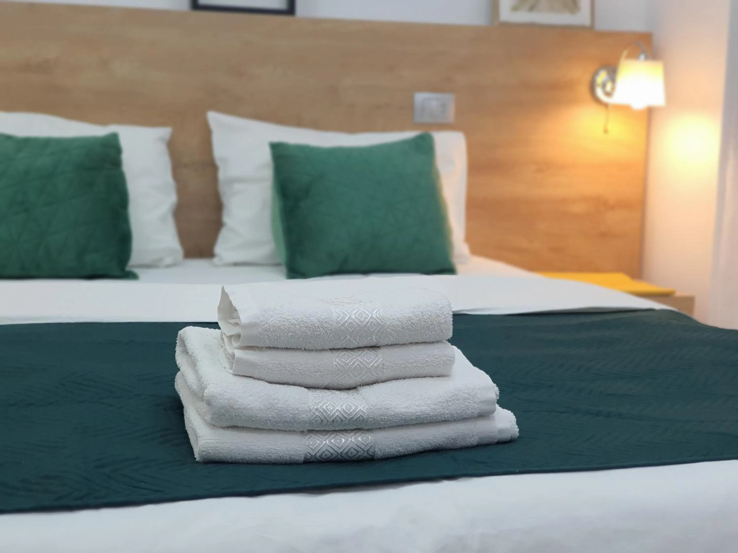 Bed in Dacia Residence Apartments