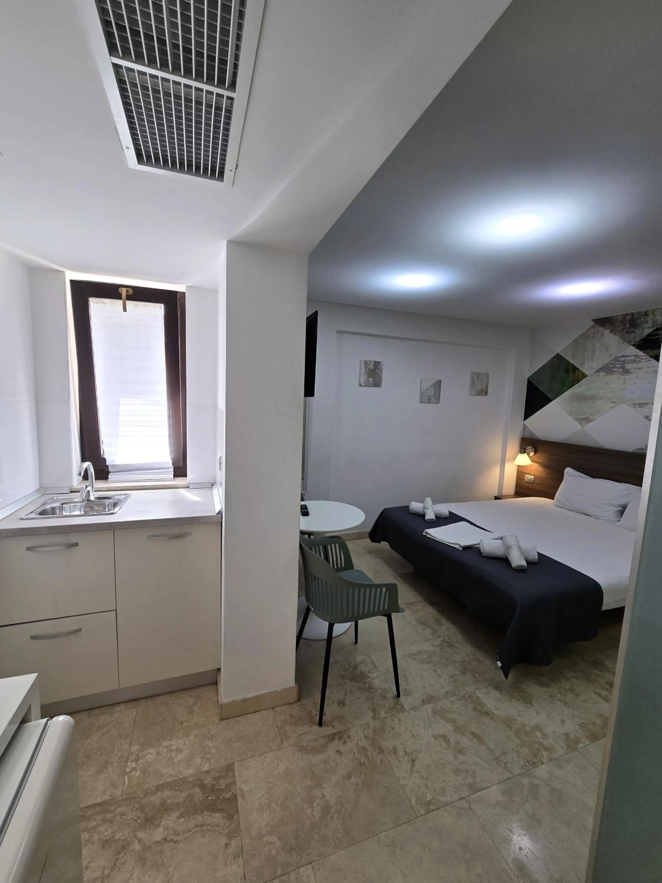Bed in Dacia Residence Apartments