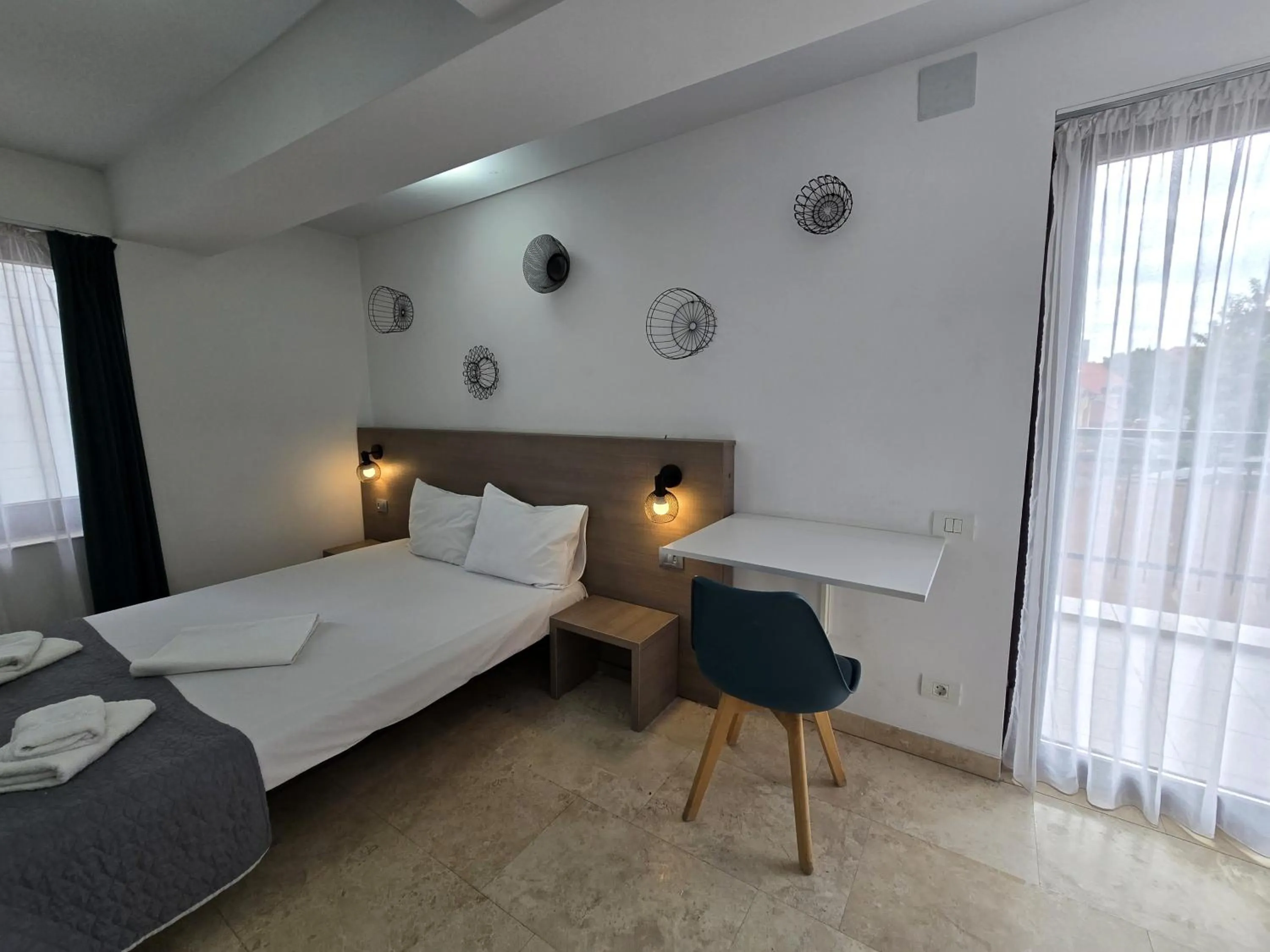 Bed in Dacia Residence Apartments