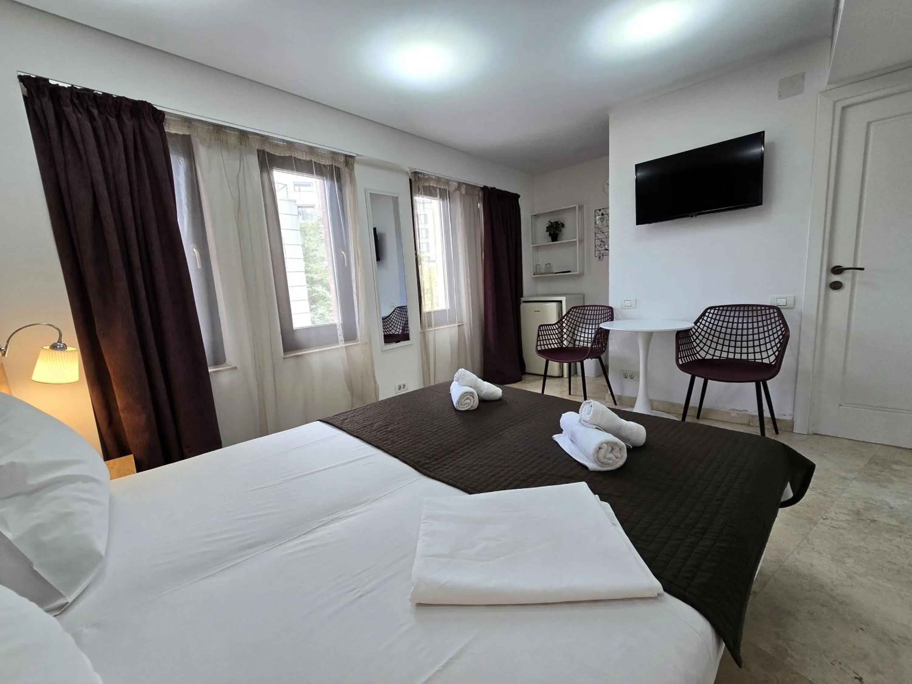 Bed in Dacia Residence Apartments