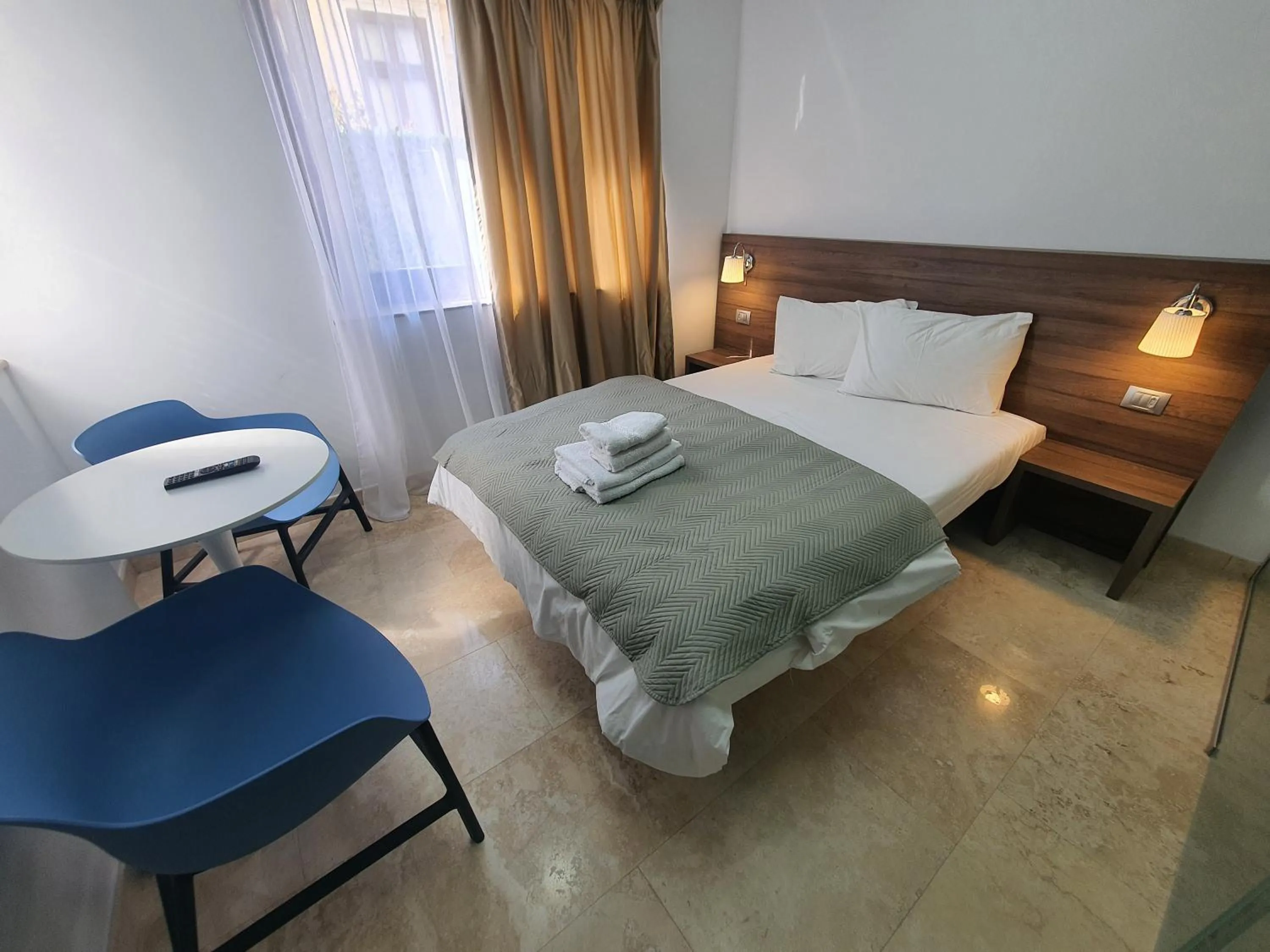 Bed in Dacia Residence Apartments