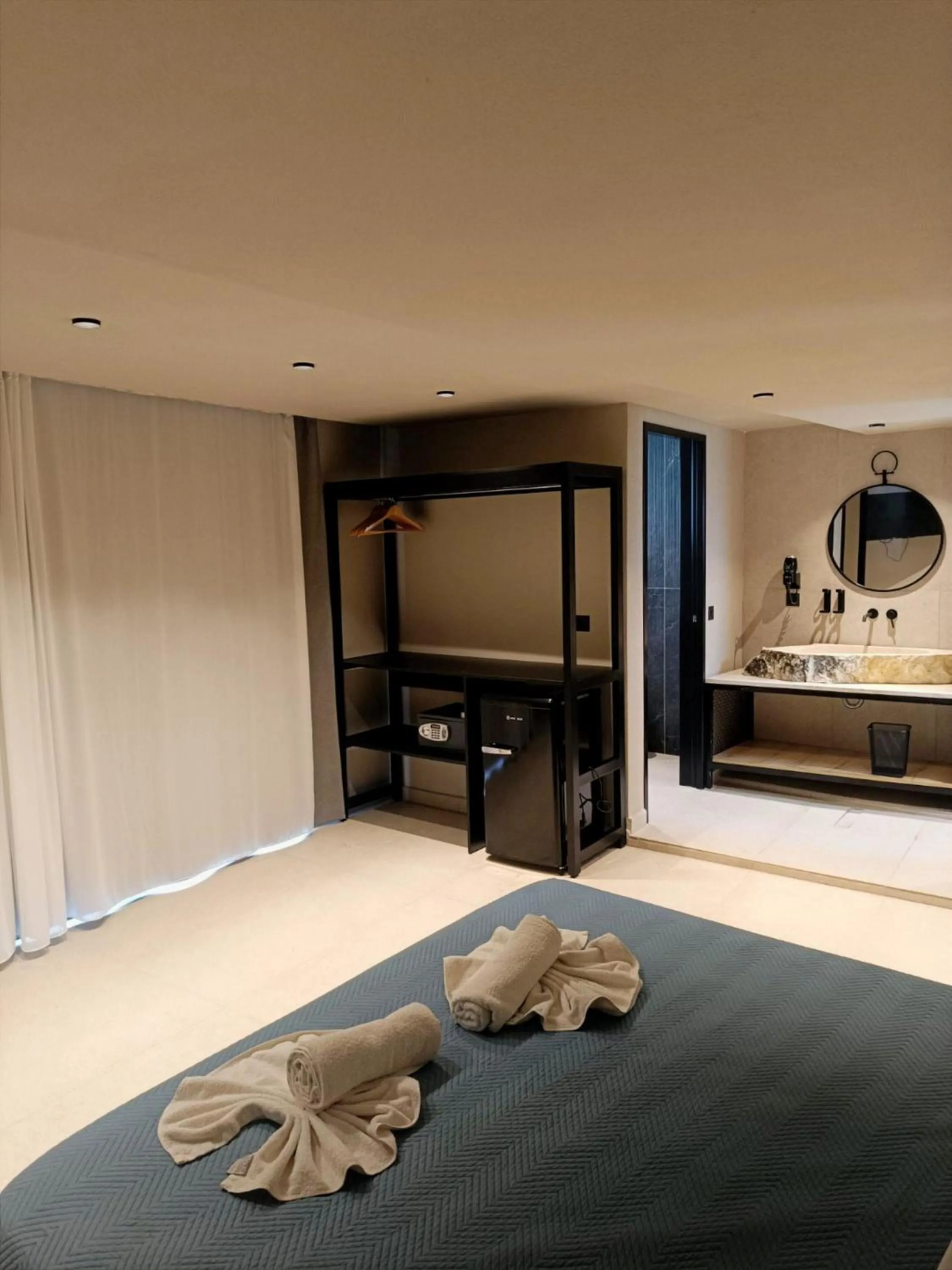 Bedroom, Bed in Kouros Home & Suites